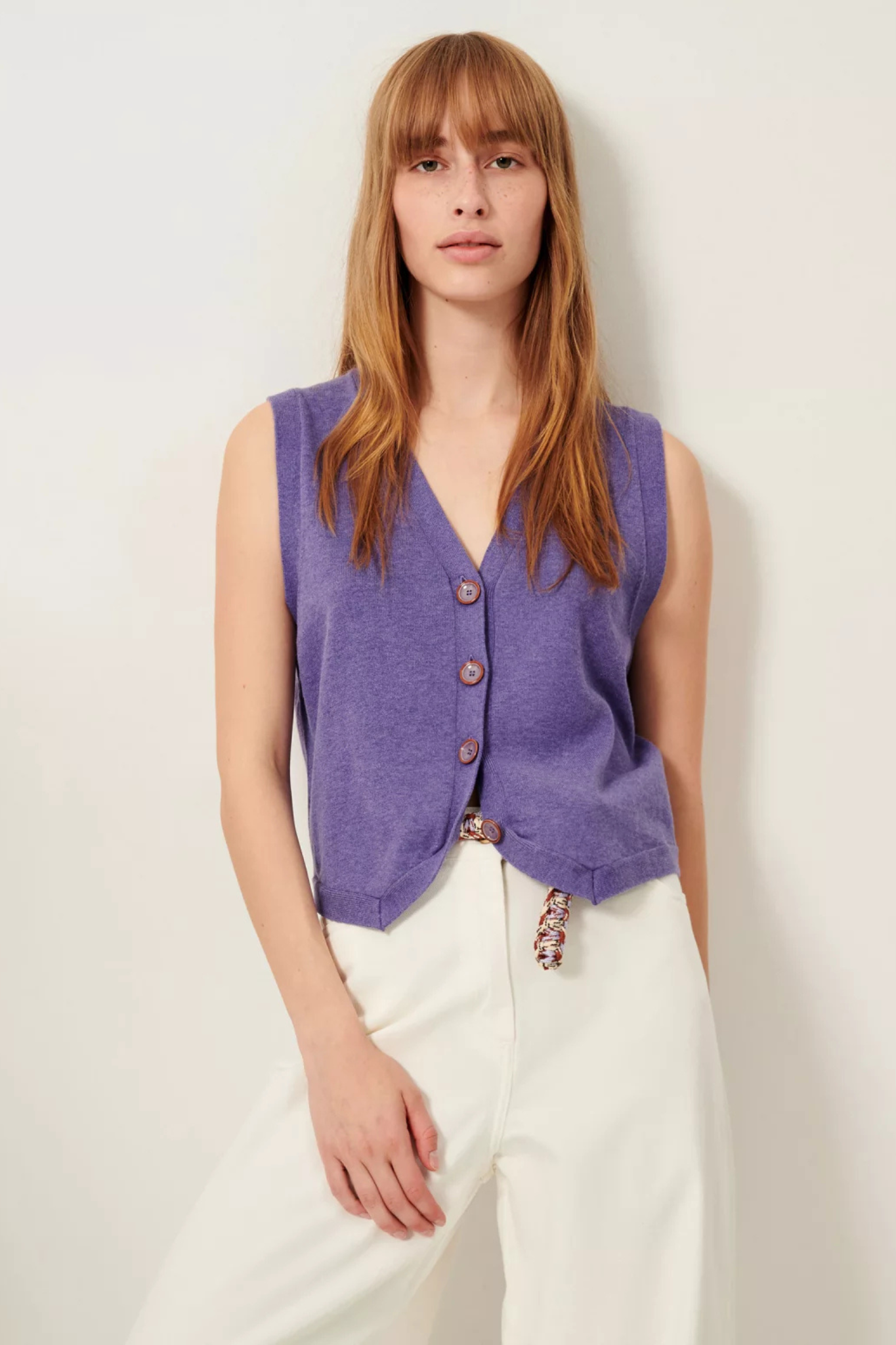 Model wearing the Sessun giancarlo cardigan in purple. Front view