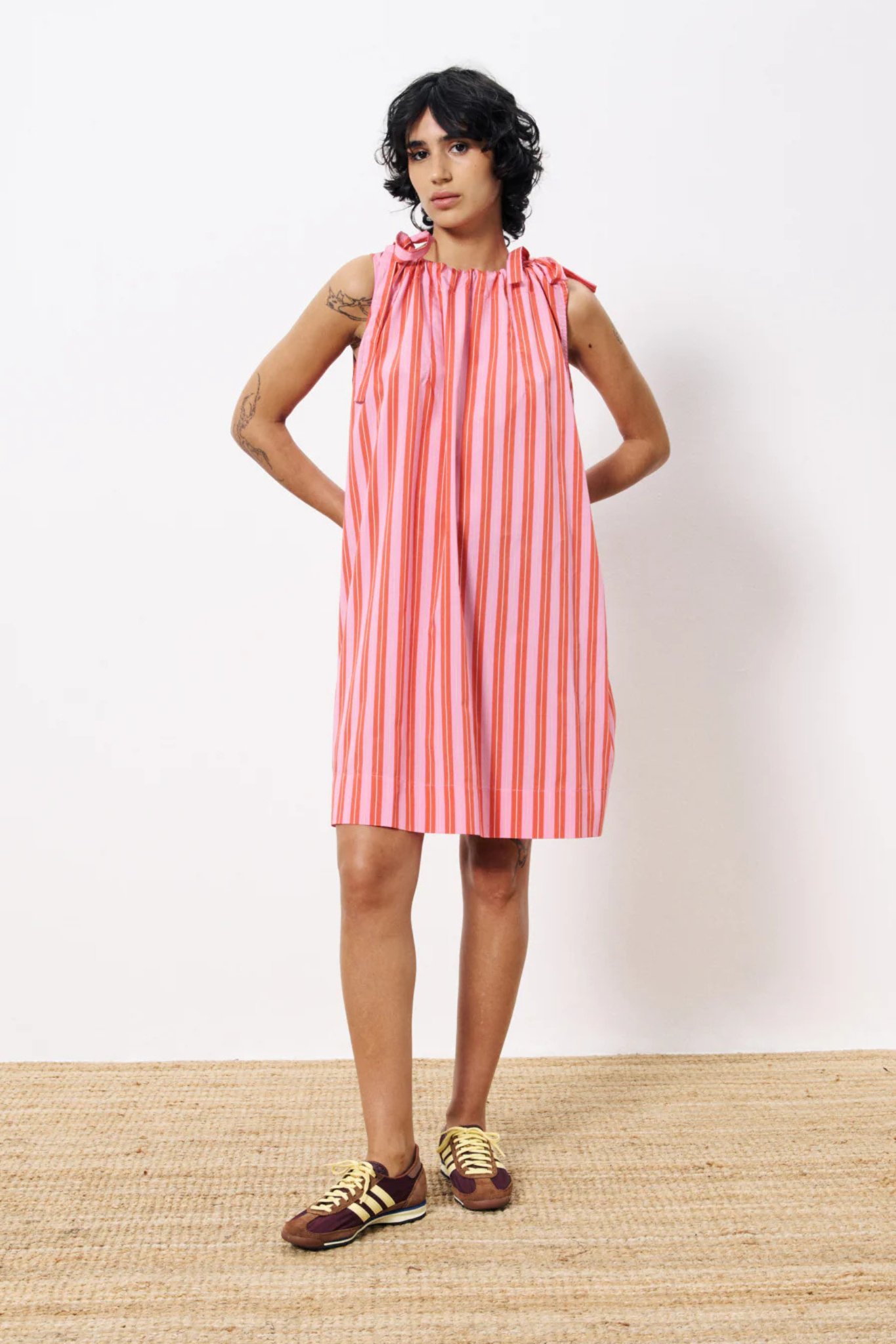 Model wearing the FRNCH aelia dress in pink. Front view