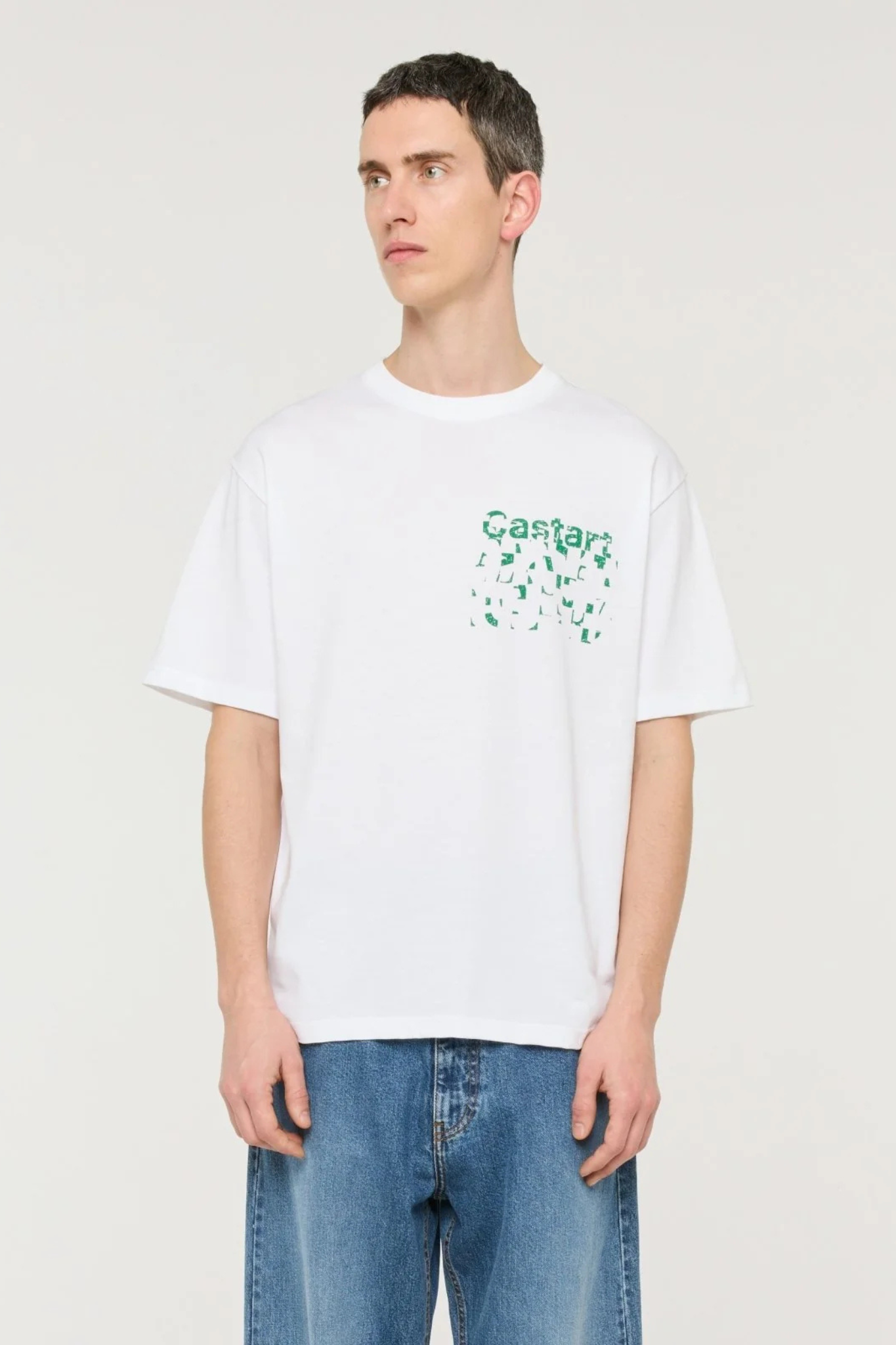 Model wearing the Castart haiku t-shirt in white and graphic in green. Front view