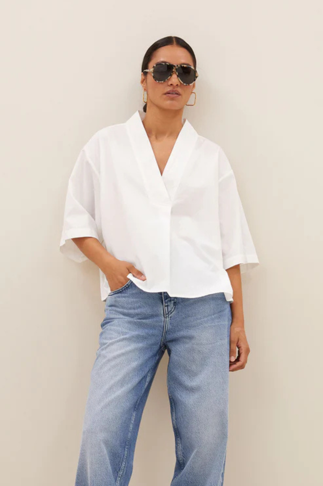 Model wearing the By-Bar owen poplin blouse in white. Front view