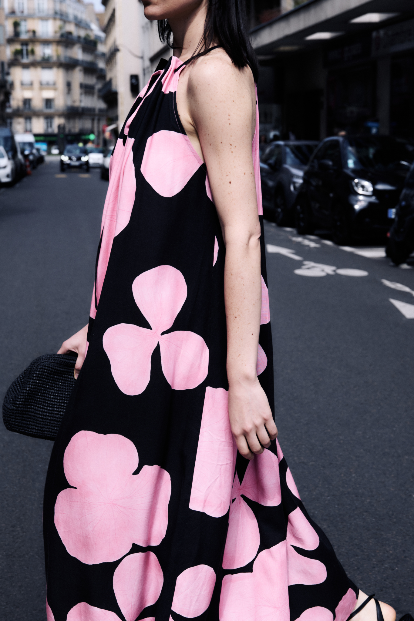 Model wearing the JIJI classis dress in maxi rose flower. Side view