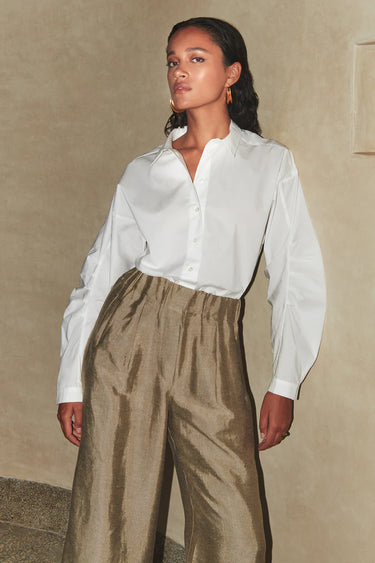 Model wearing the By-Bar Penny poplin blouse in white. Front view