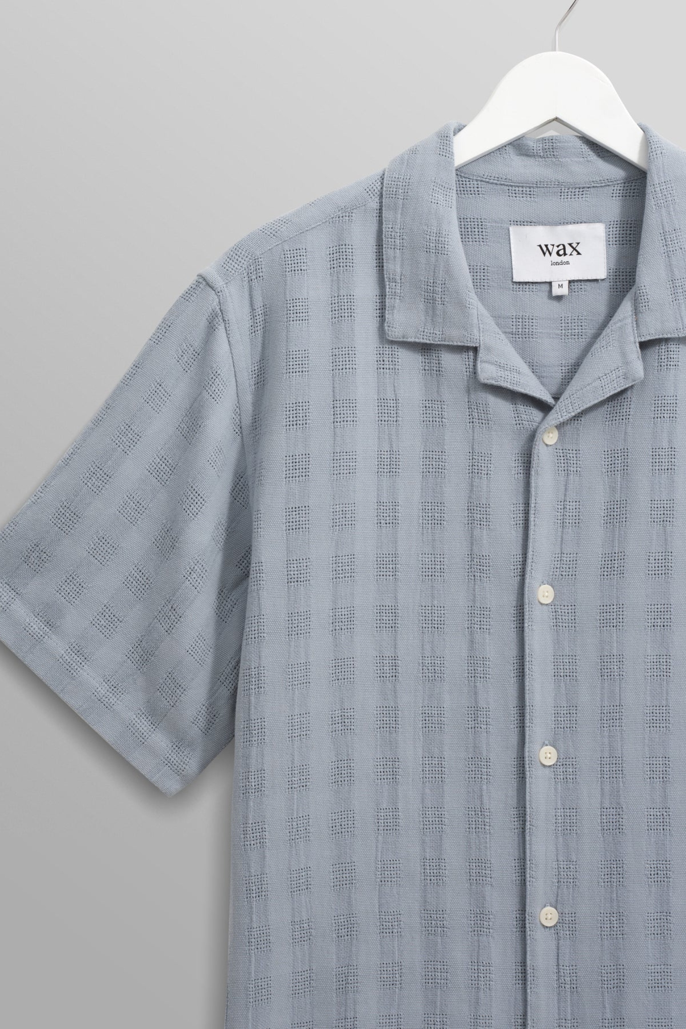 Wax London didcot box open weave grid shirt in pale blue. Front view 