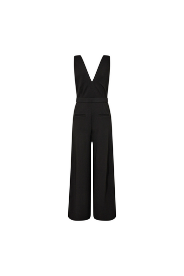 Co'Couture deep V jumpsuit in black. Back flatlay view