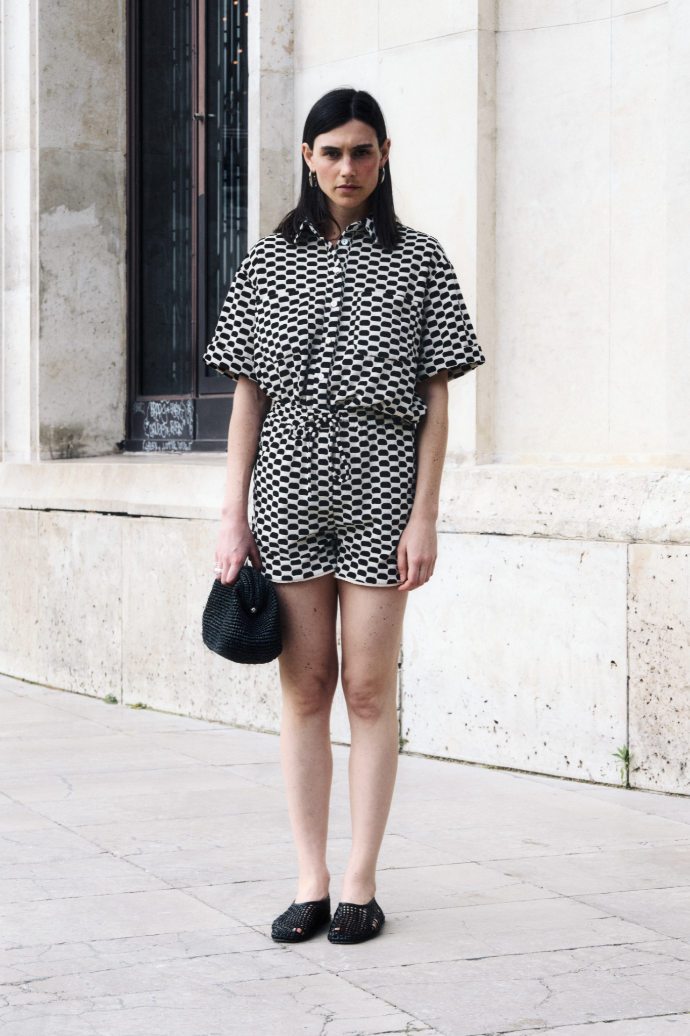 Model wearing the JIJI chloe shirt in creme and black. Front view