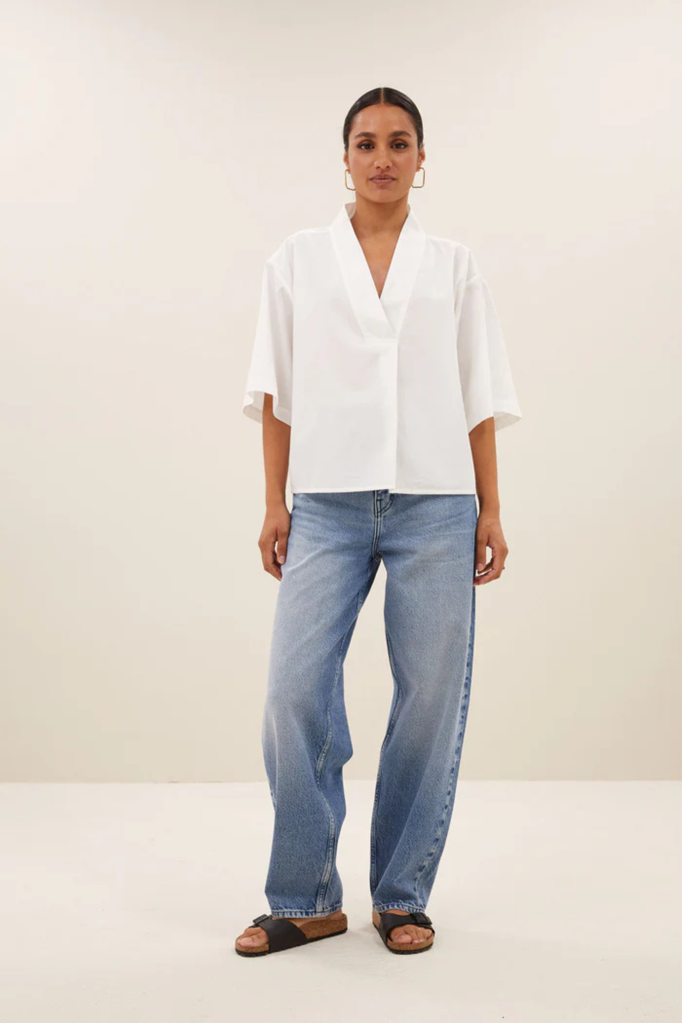 Model wearing the By-Bar owen poplin blouse in white. Front view