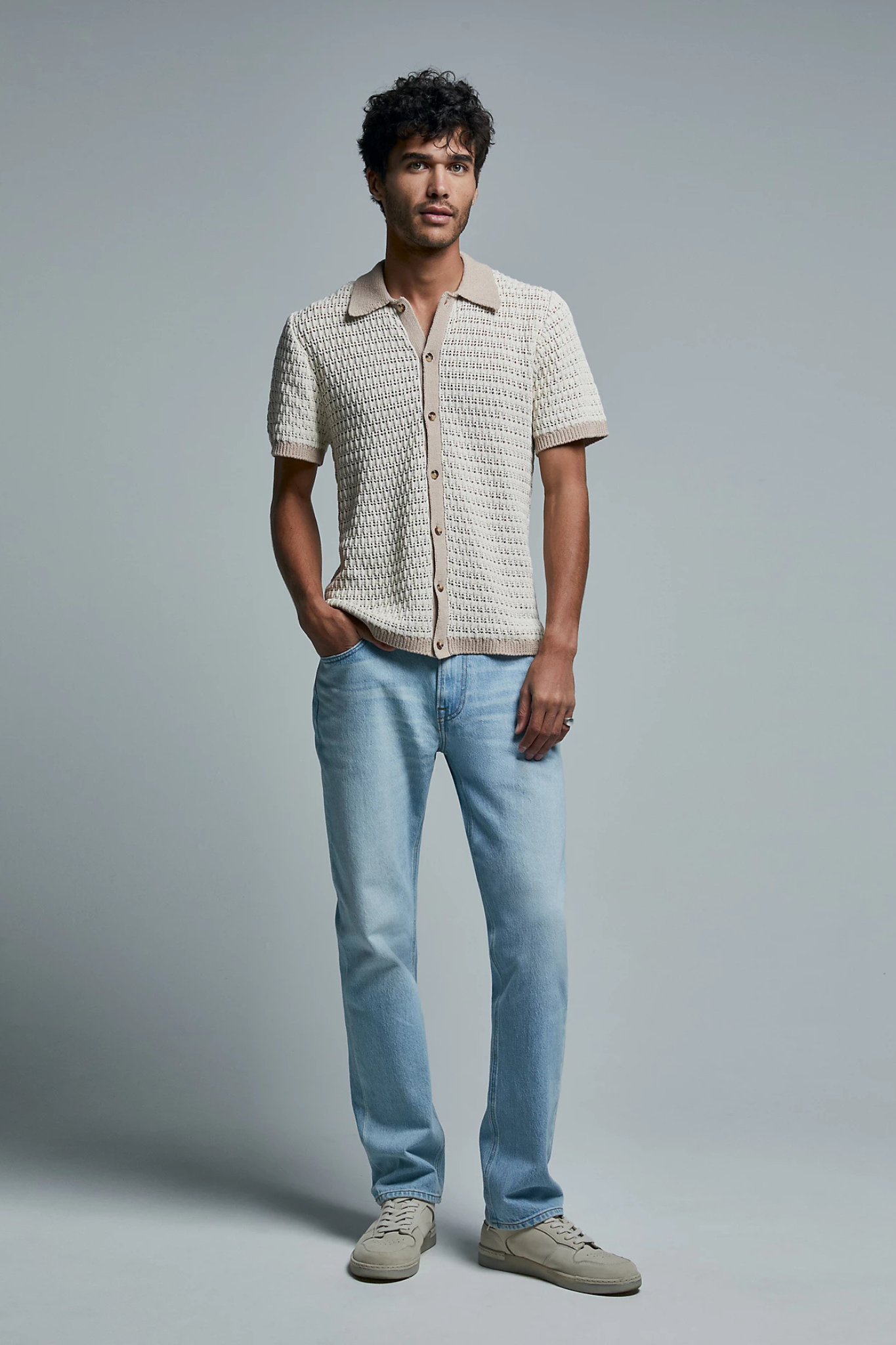 Model wearing the Lee west jeans in light blue. Front view