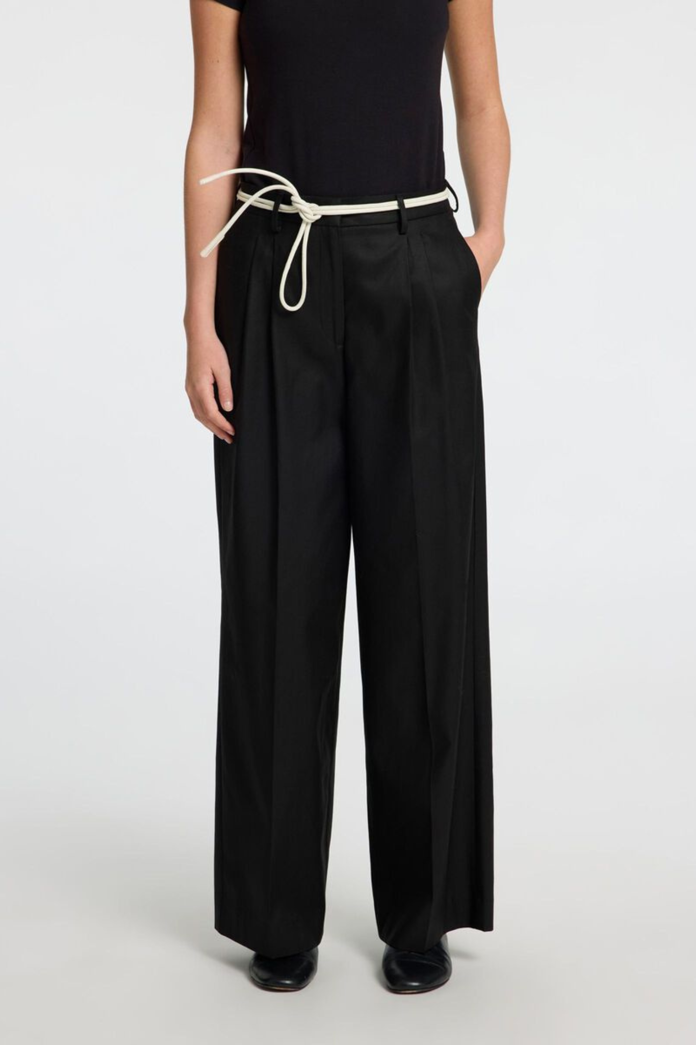 Model wearing the Selected Femme dora merla hw extra wide pants in black. Front view