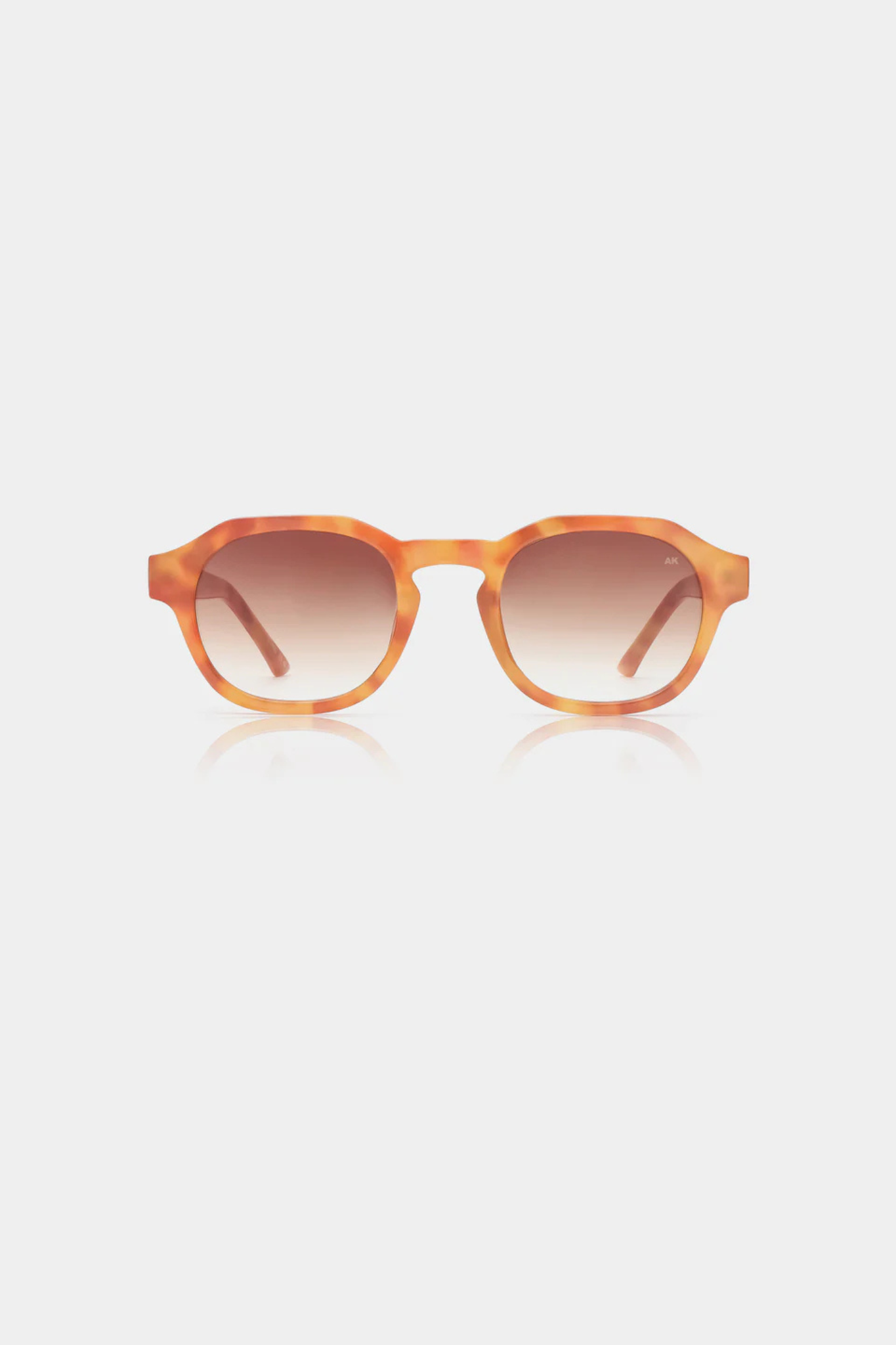 A. Kjaerbede zan sunglasses in burnt amber / orange. Front view