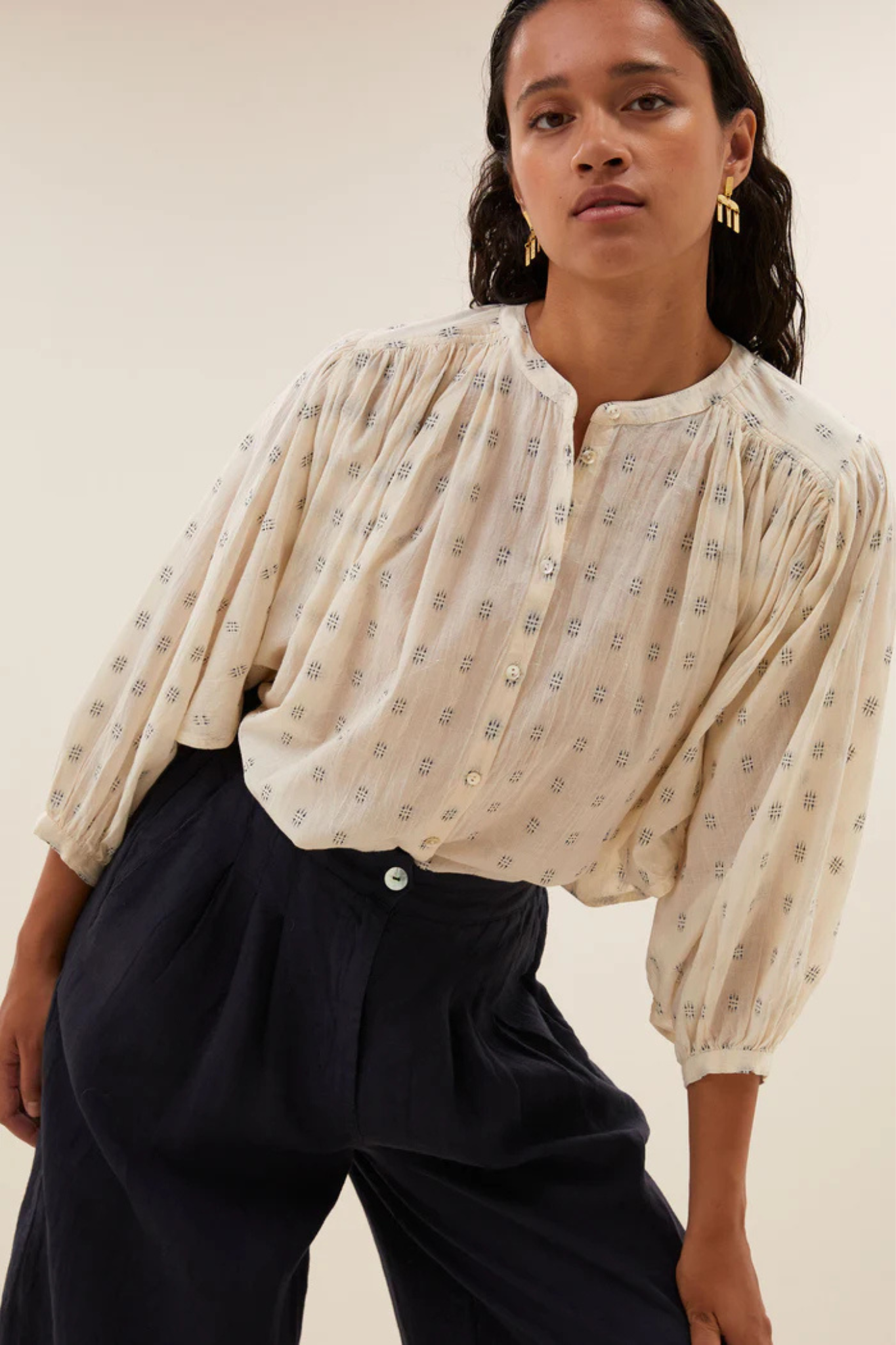 Model wearing the By-Bar becky dali blouse in white and blue. Front view