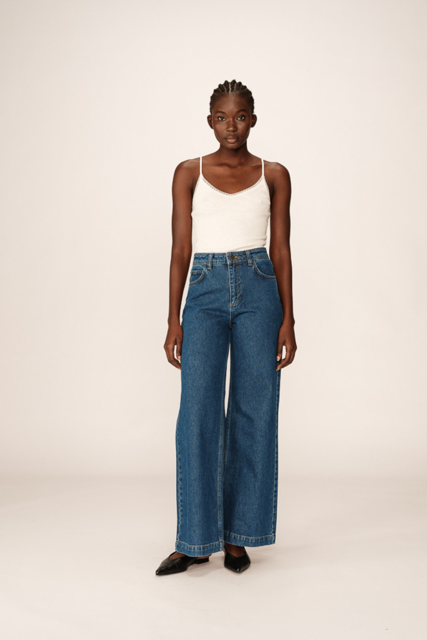 Model wearing the Grace & Mila james jeans in medium blue. Front view