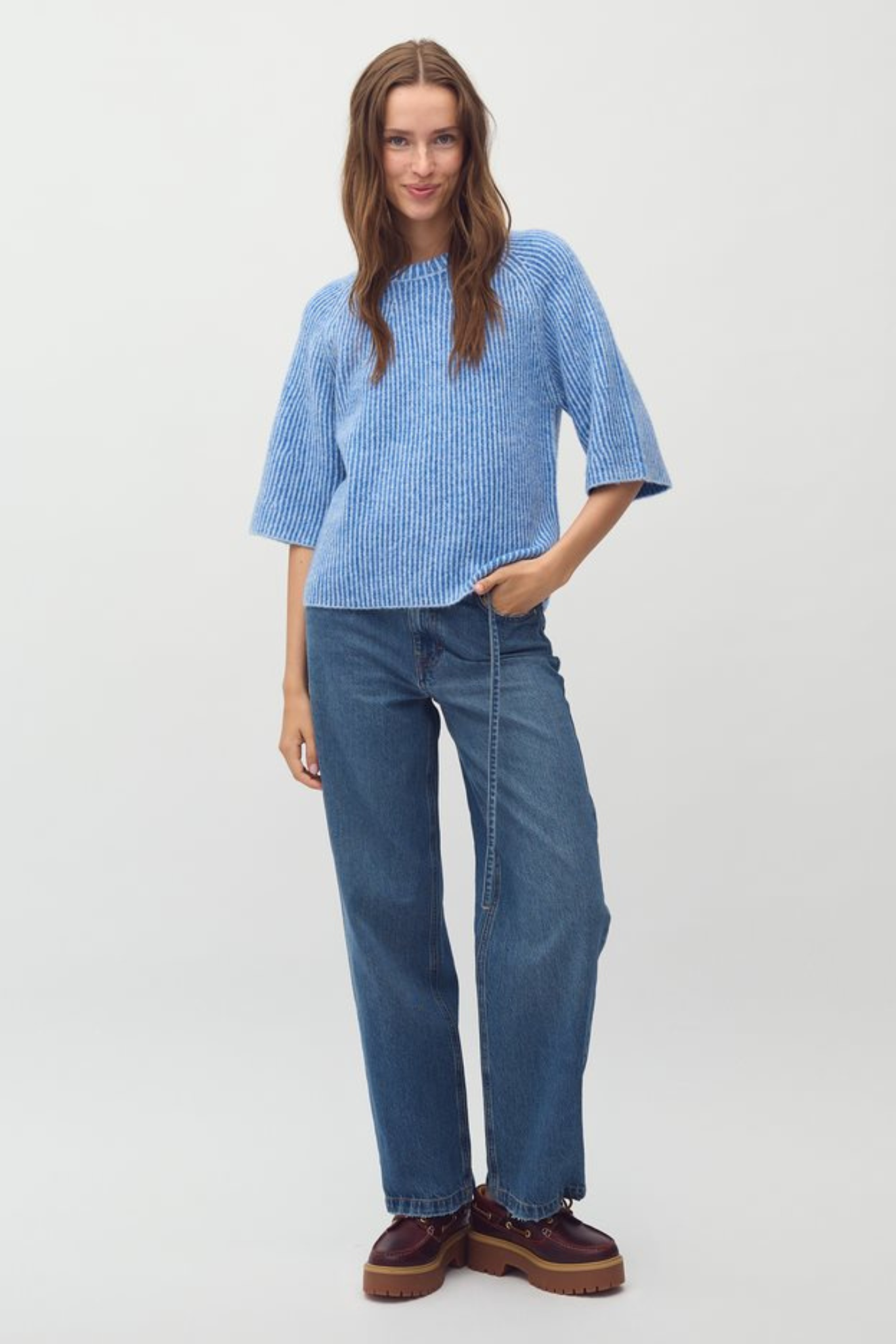 Model wearing the Mbym ubeda hevelyn knit in blue. Front view