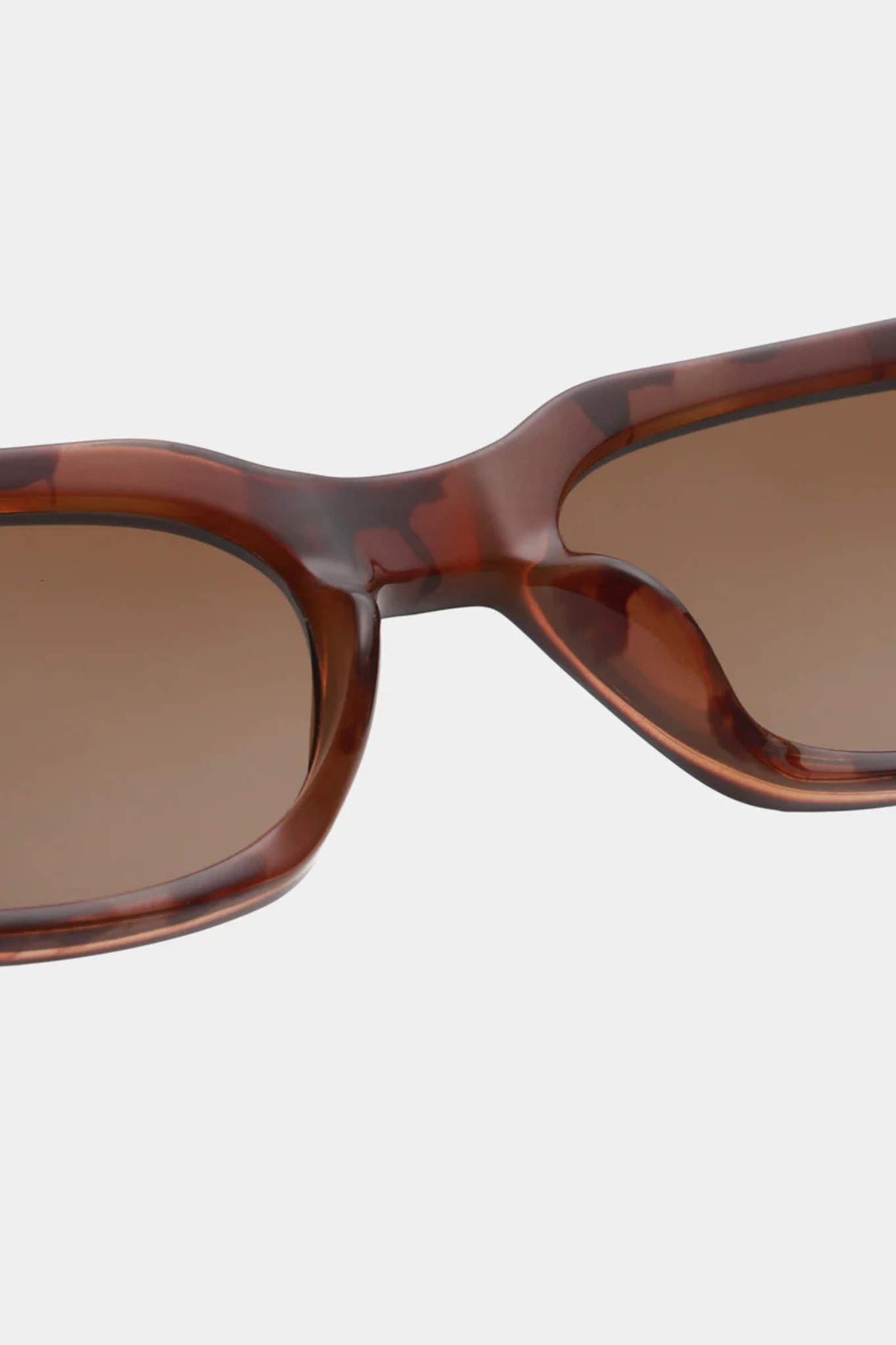 A. Kjaerbede bror sunglasses in brown/demi light brown transparent. Close front view