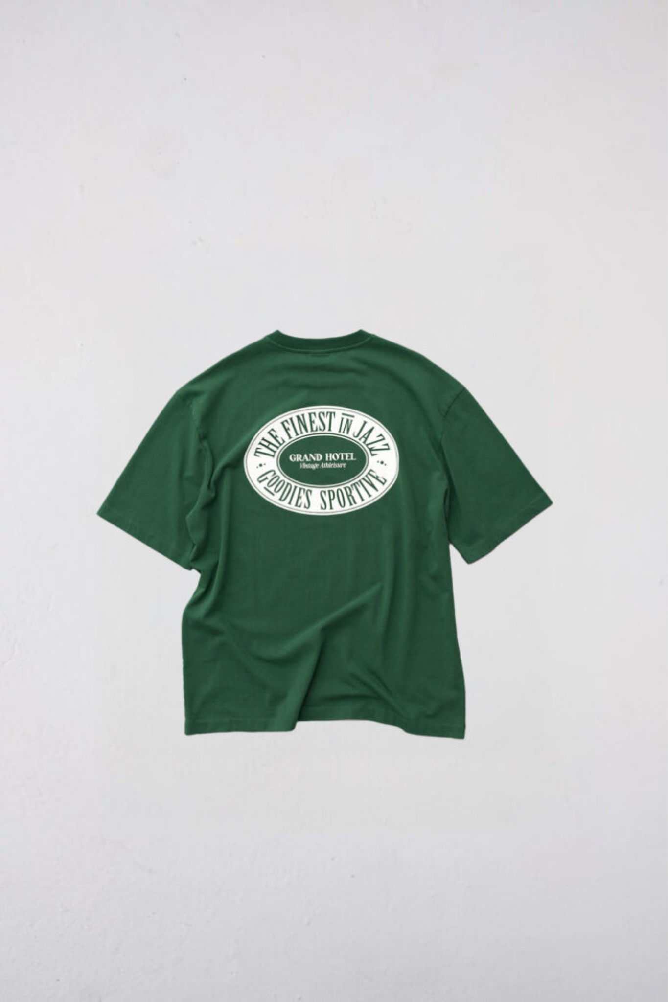 Goodies Sportive finest t-shirt in green and graphic in white. Back flatlay view