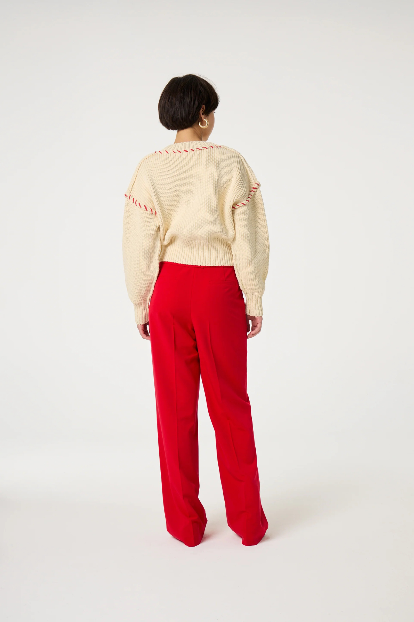 Model wearing the Fabienne Chapot Nelsan pants in red. Back view