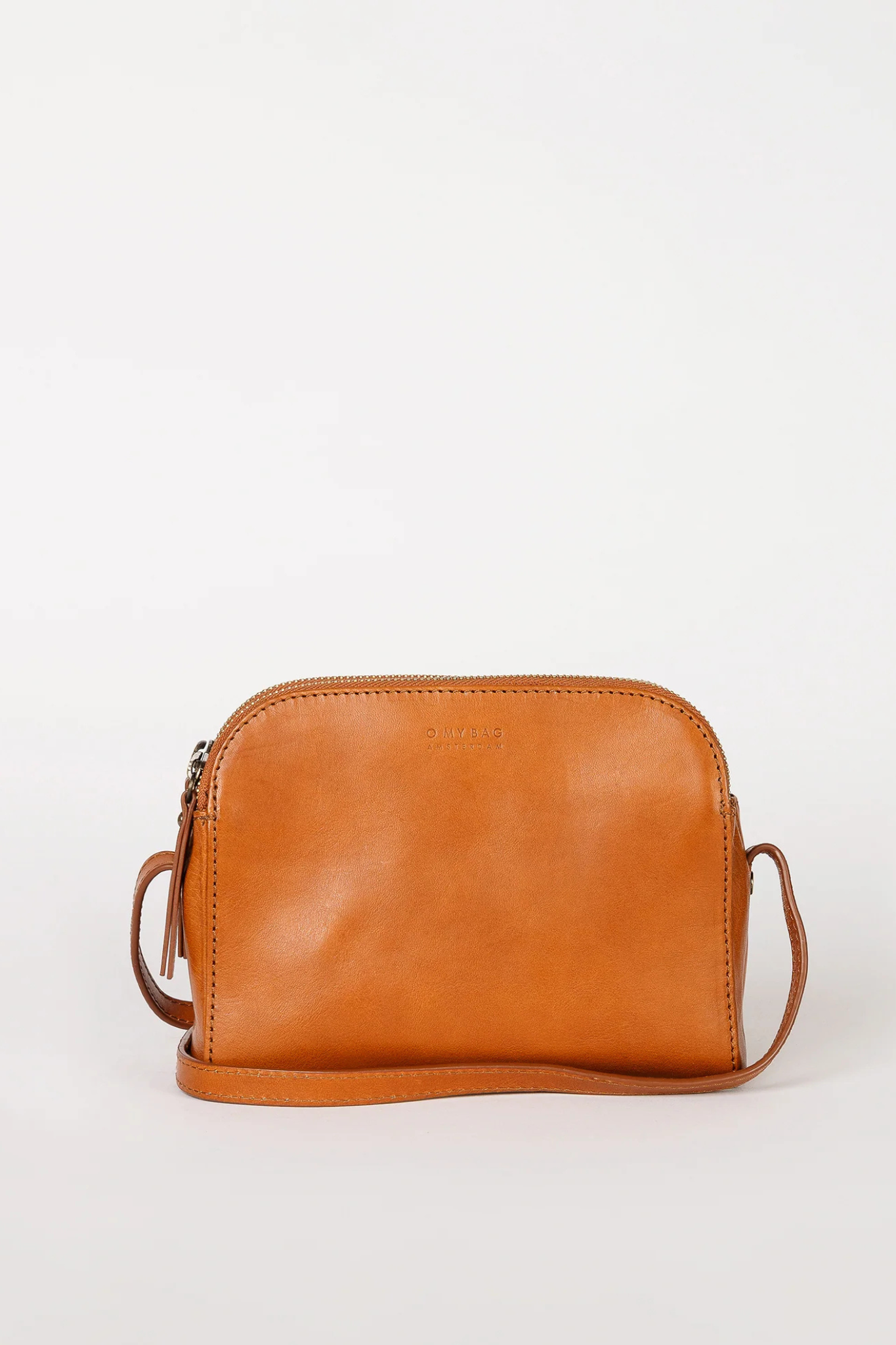 O MY BAG Emily cognac stromboli leather bag. Front flatlay view