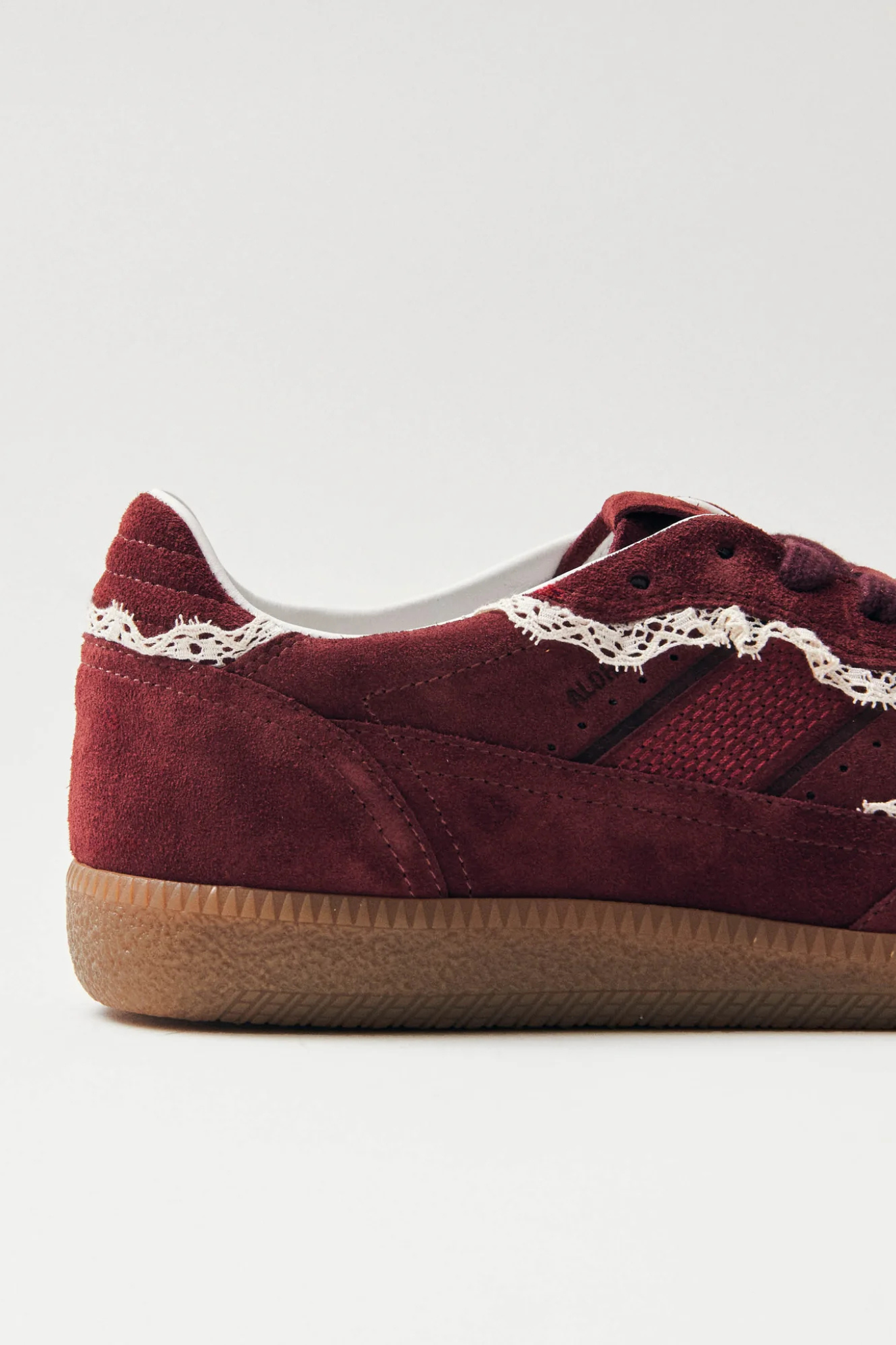 Alohas crochet leather sneakers in burgundy. Close side view