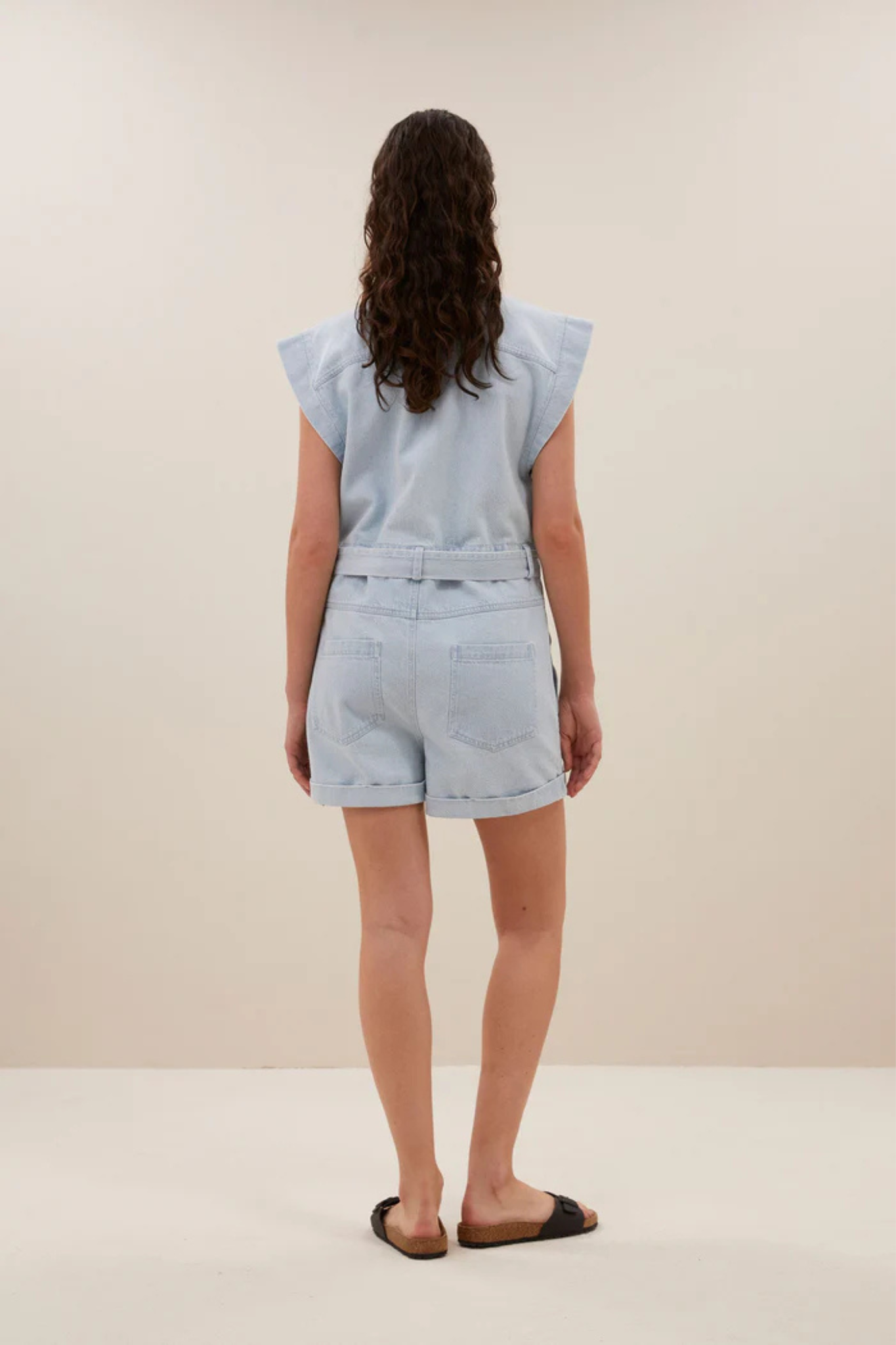 Model wearing the By-Bar ollie bleached denim suit in bleached denim. Back view