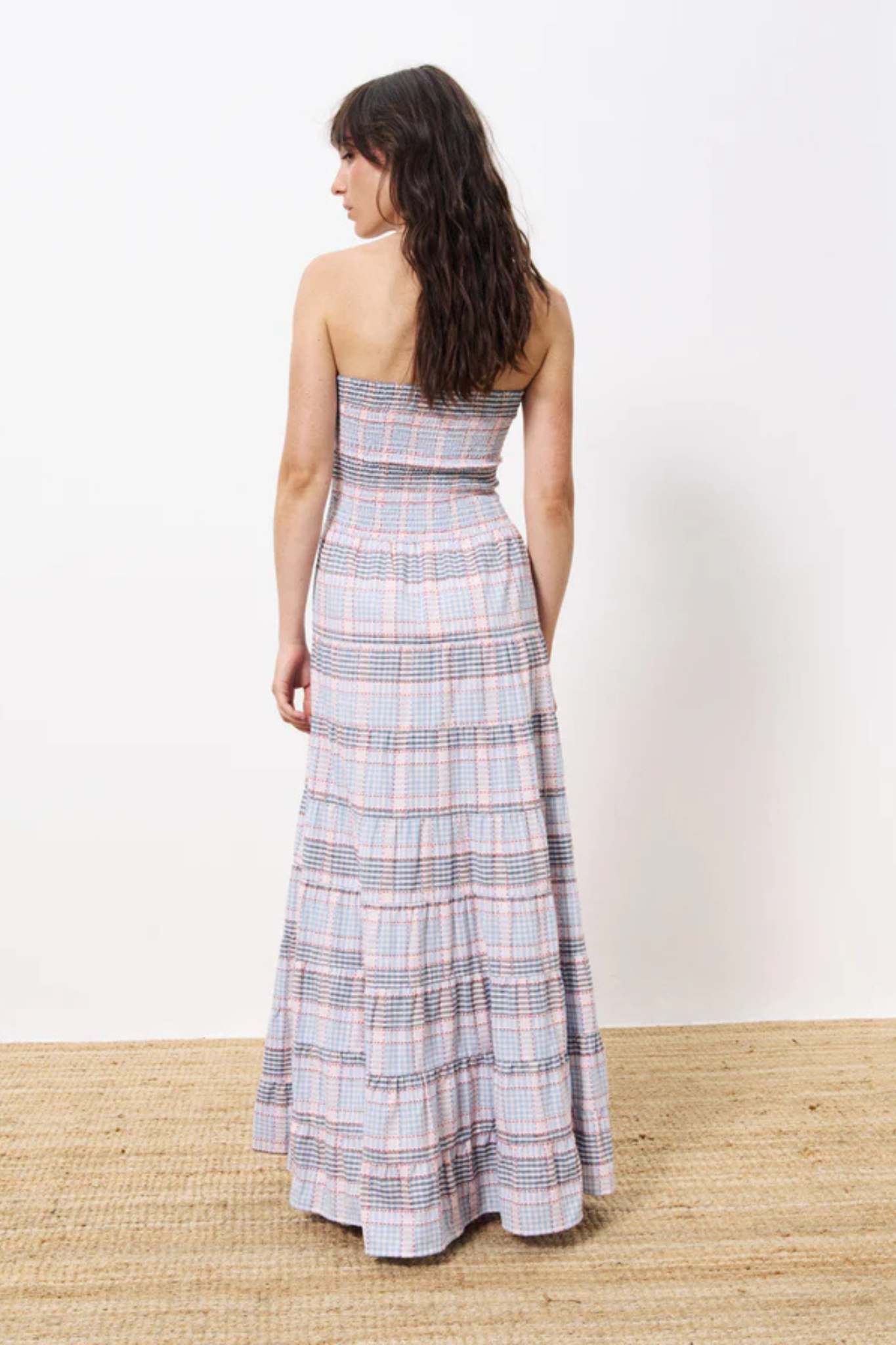 Model wearing the FRNCH dalel dress in light blue checked. Back view