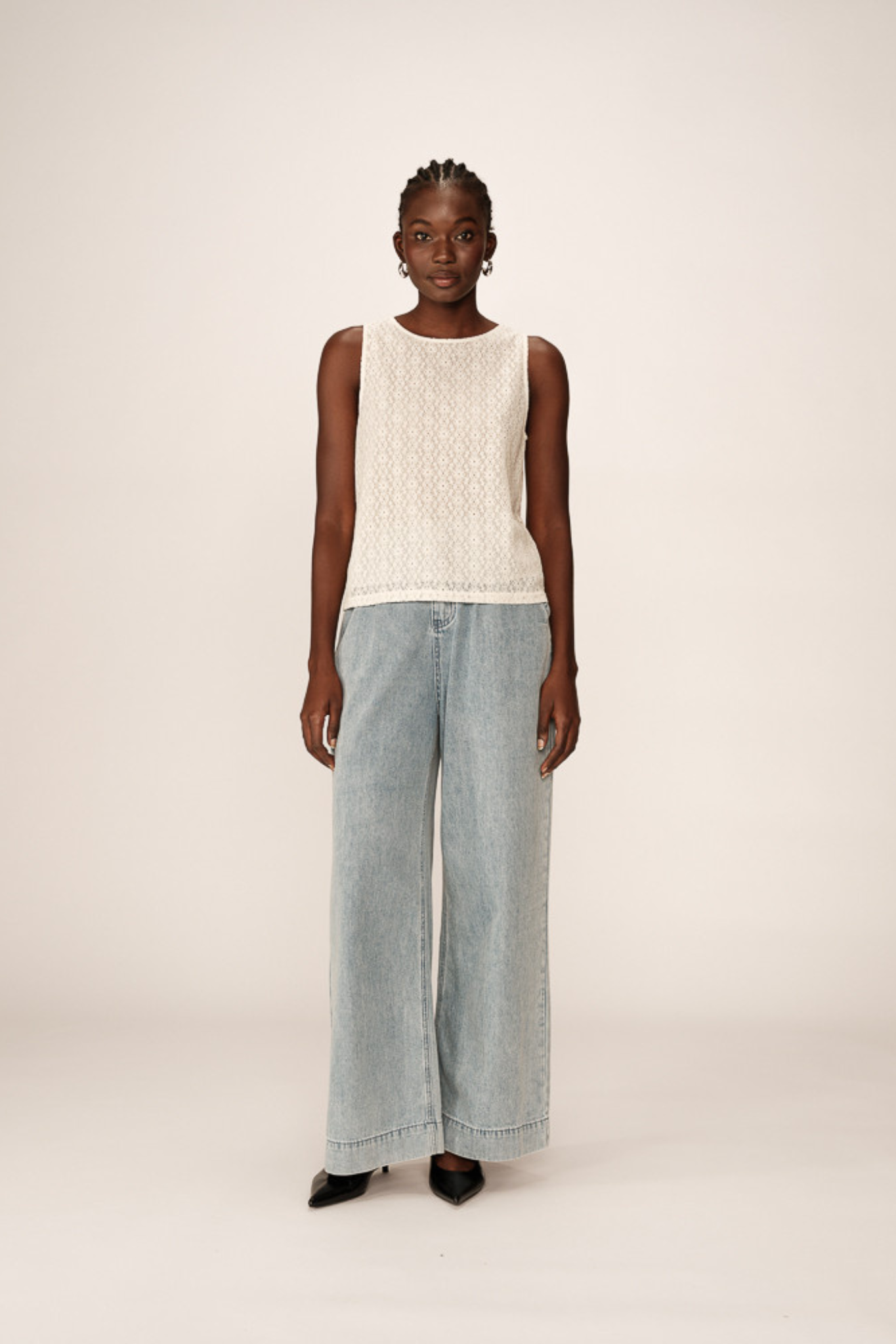 Model wearing the Grace & Mila passionnee top in ecru. Front view