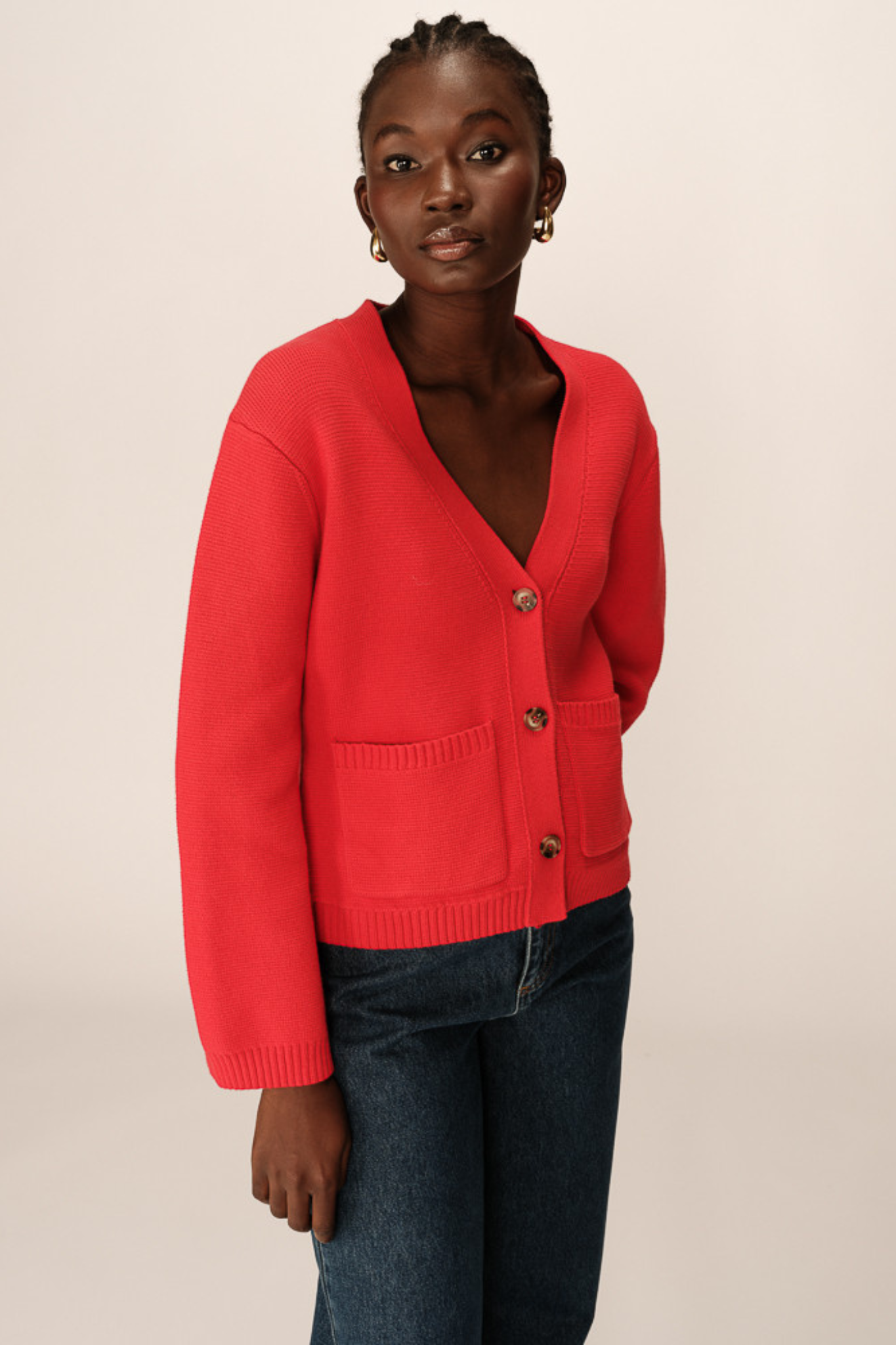 Model wearing the Grace & Mila paolino cardigan jacket in red. Front view