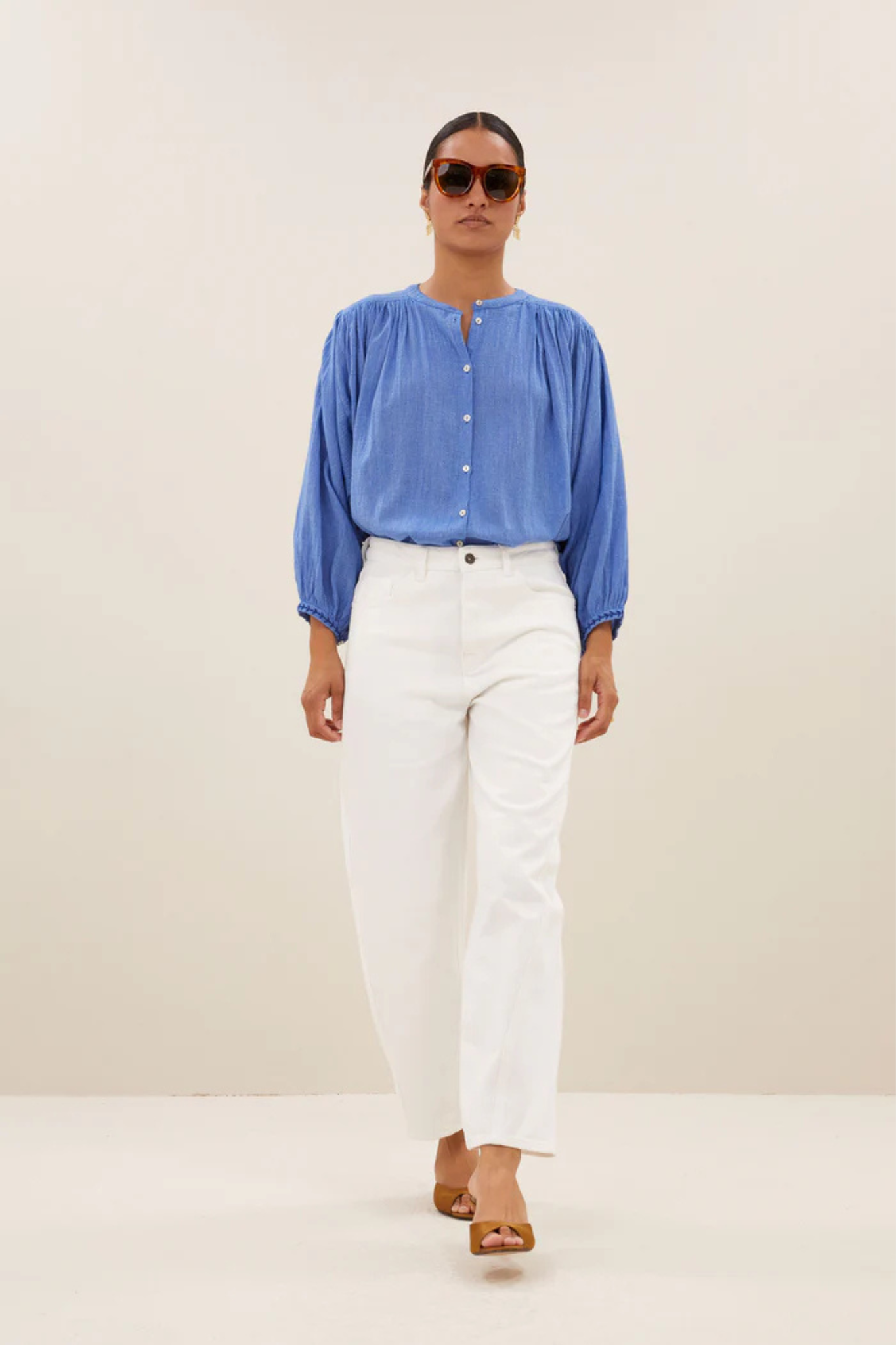 Model wearing the By-Bar becky athia blouse in sapphire blue. Front view