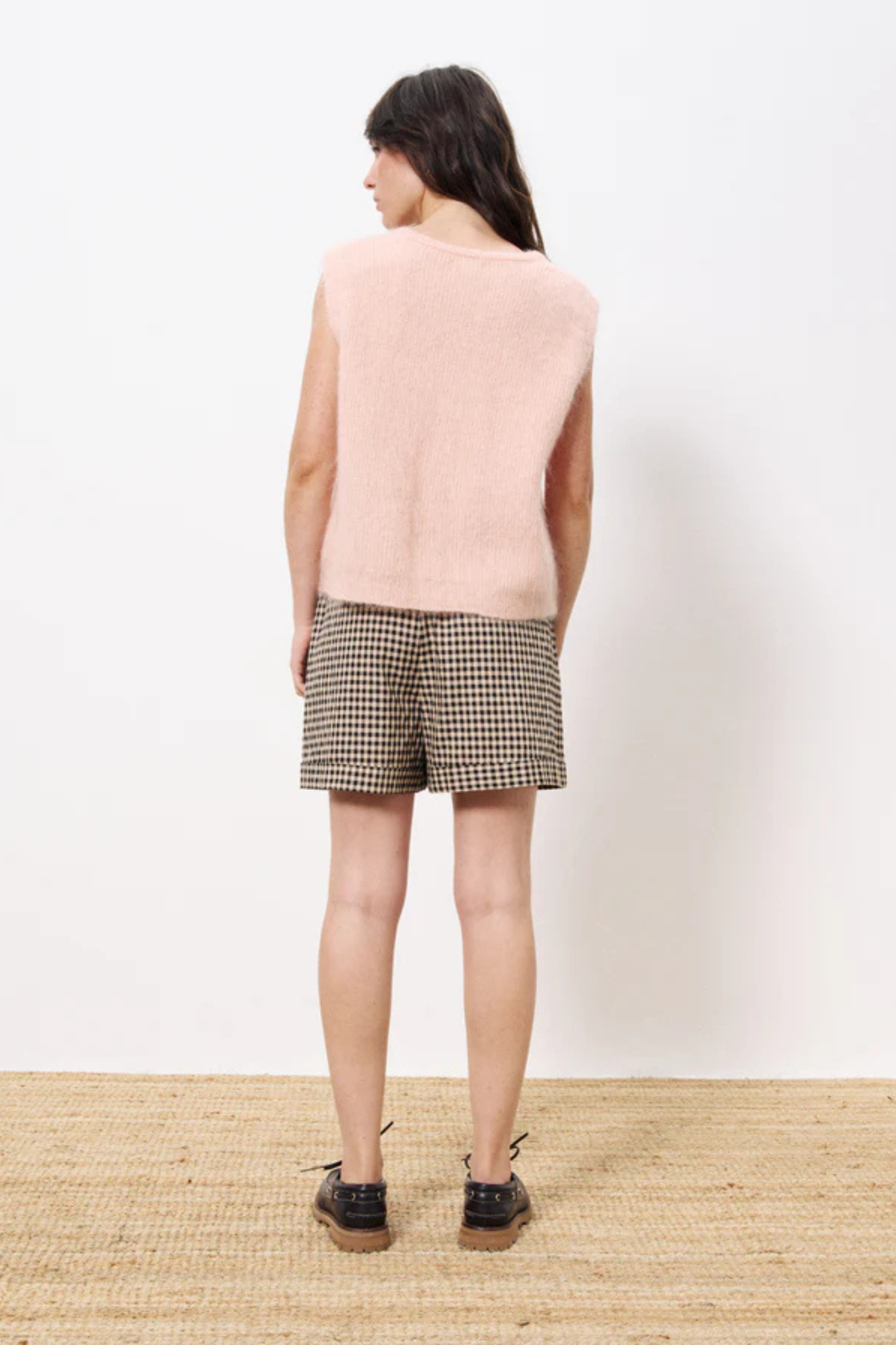 Model wearing the FRNCH meliza cardigan in rose pale. Back view