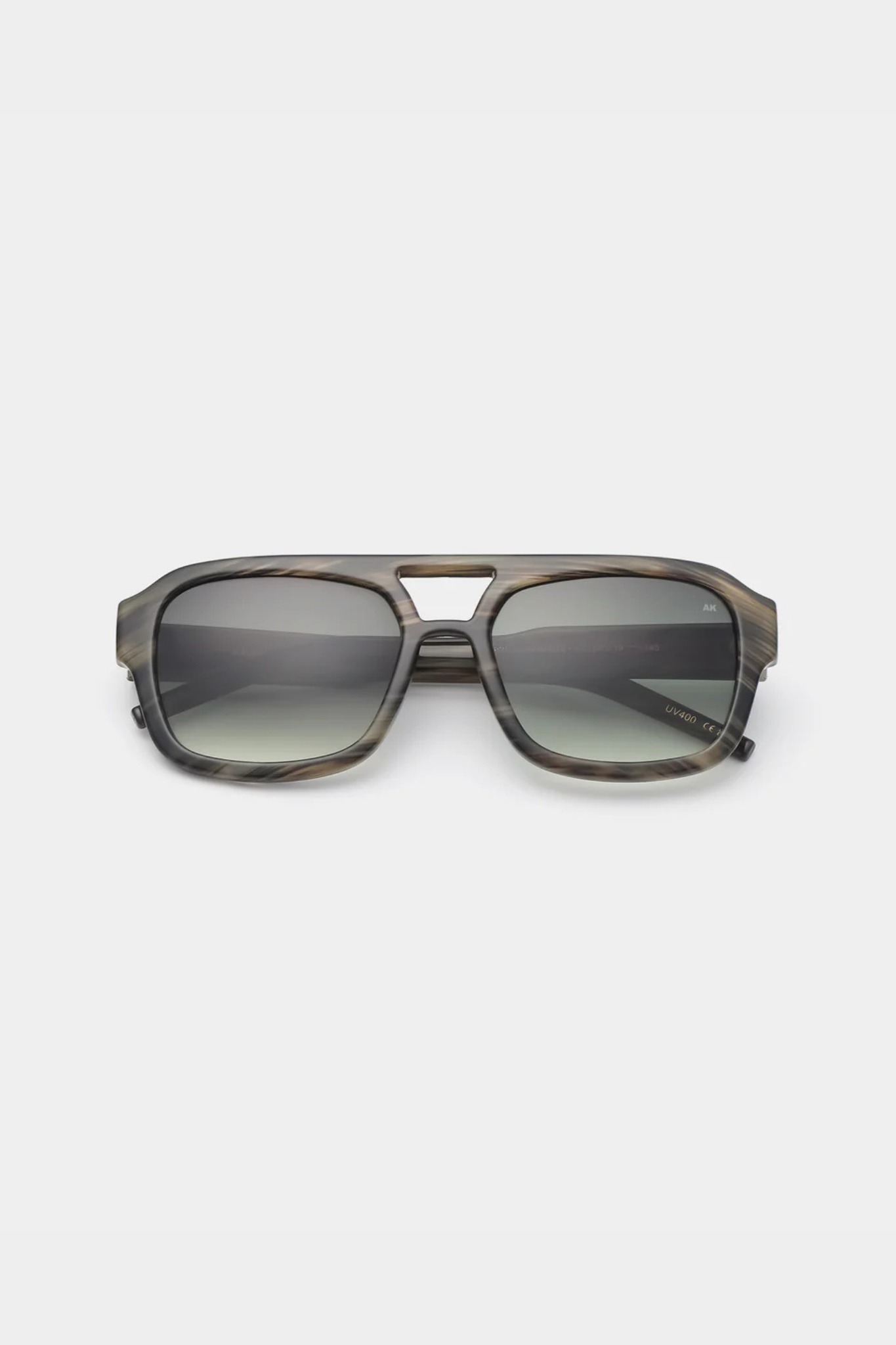 A. Kjaerbede kaya sunglasses in striped horn. Front view