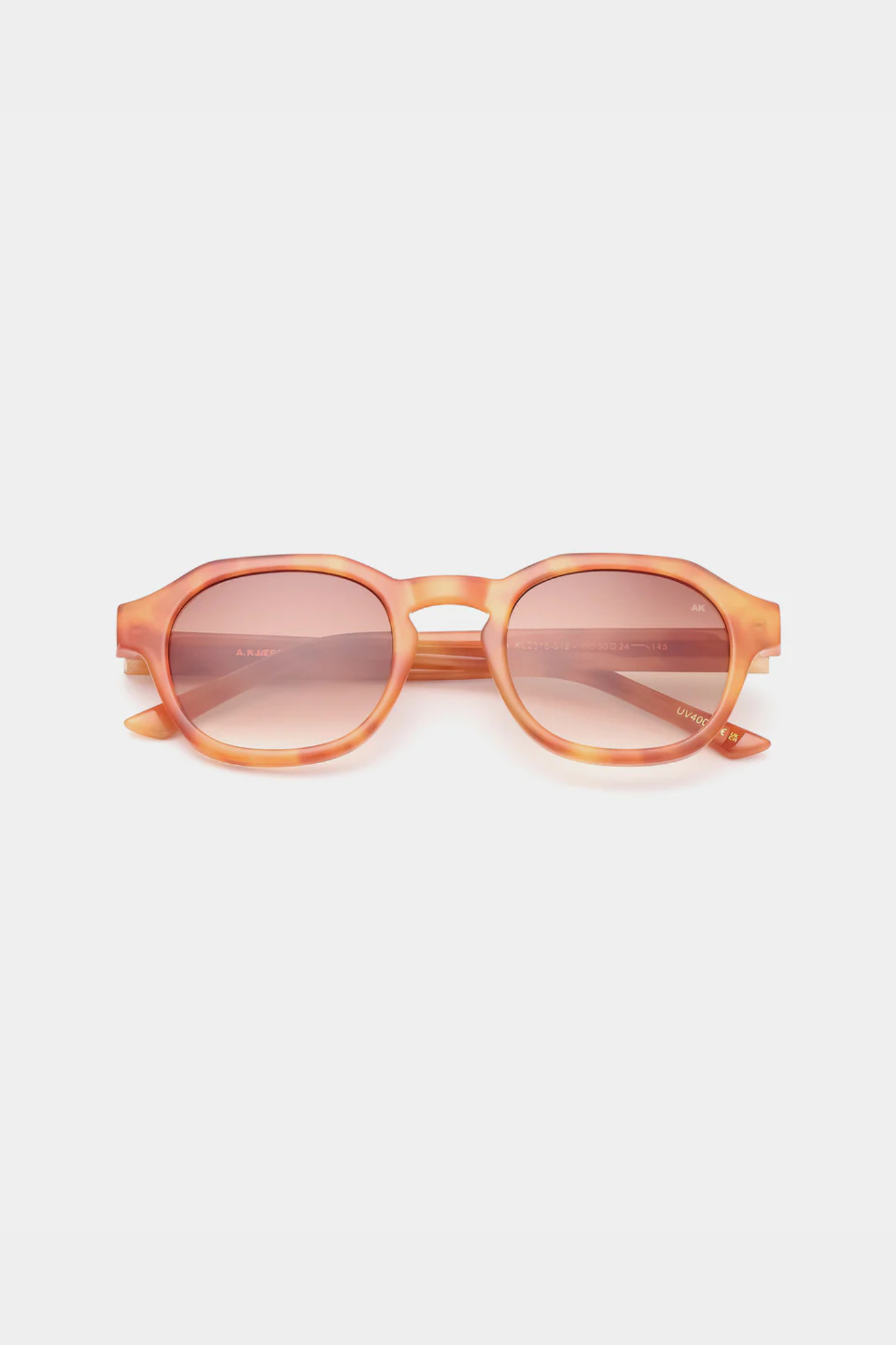 A. Kjaerbede zan sunglasses in burnt amber / orange. Front view