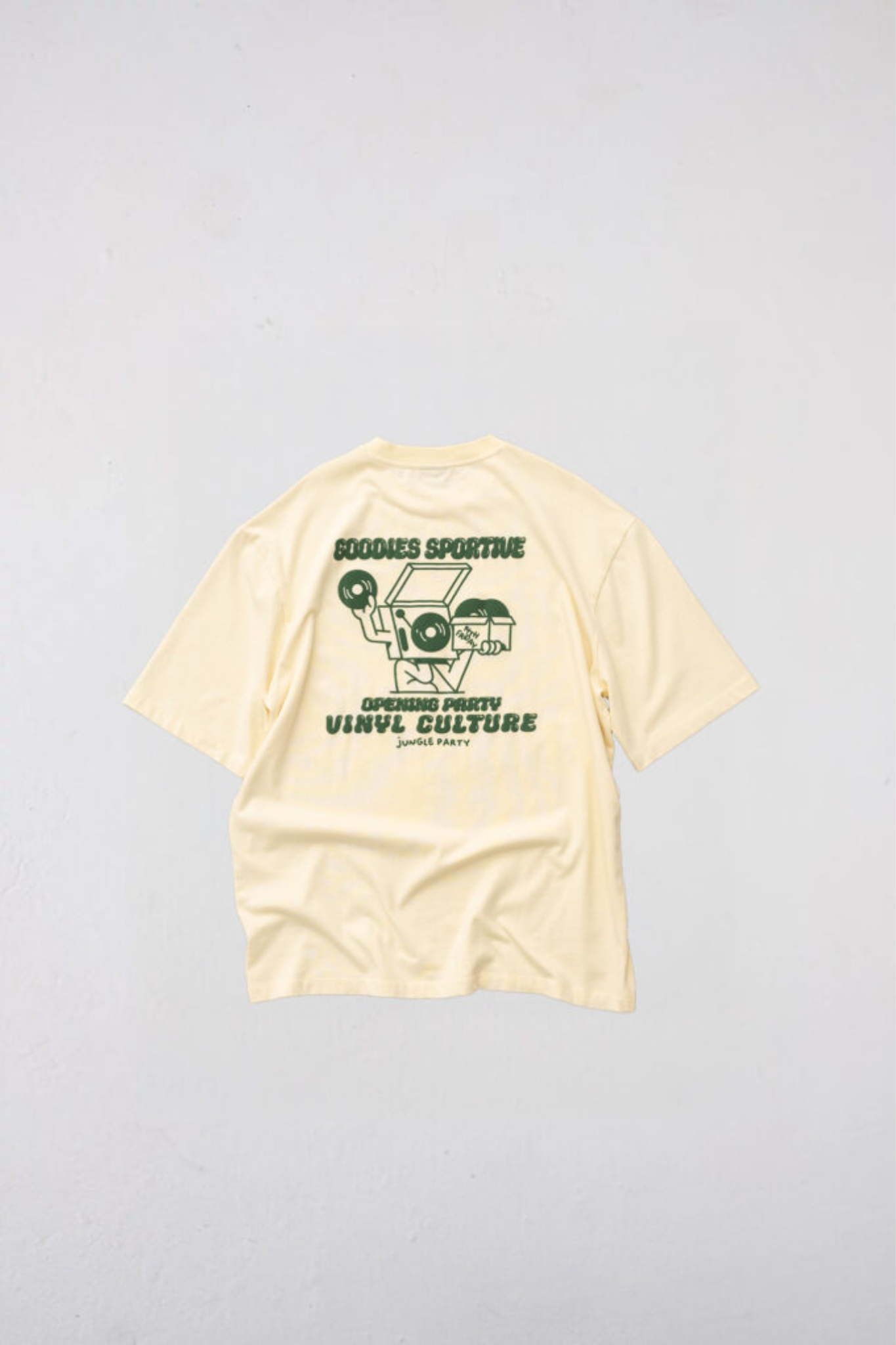 Goodies Sportive vinyl culture t-shirt in butter and graphic in green. Back flatlay view