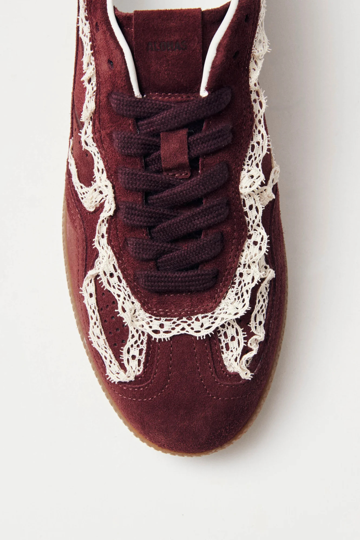 Alohas crochet leather sneakers in burgundy. Front view