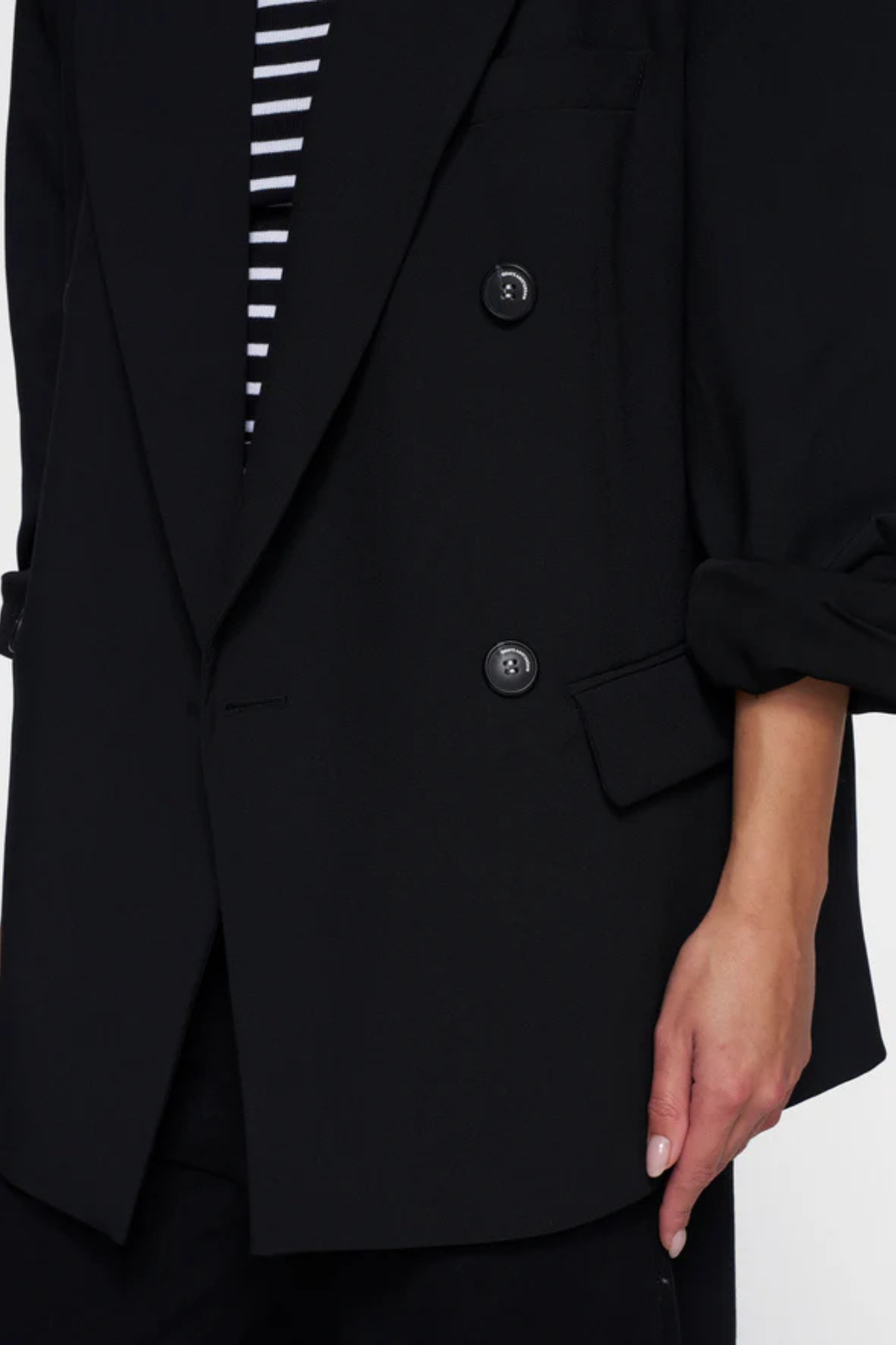 Model wearing the 10DAYS proud blazer in black. Front view