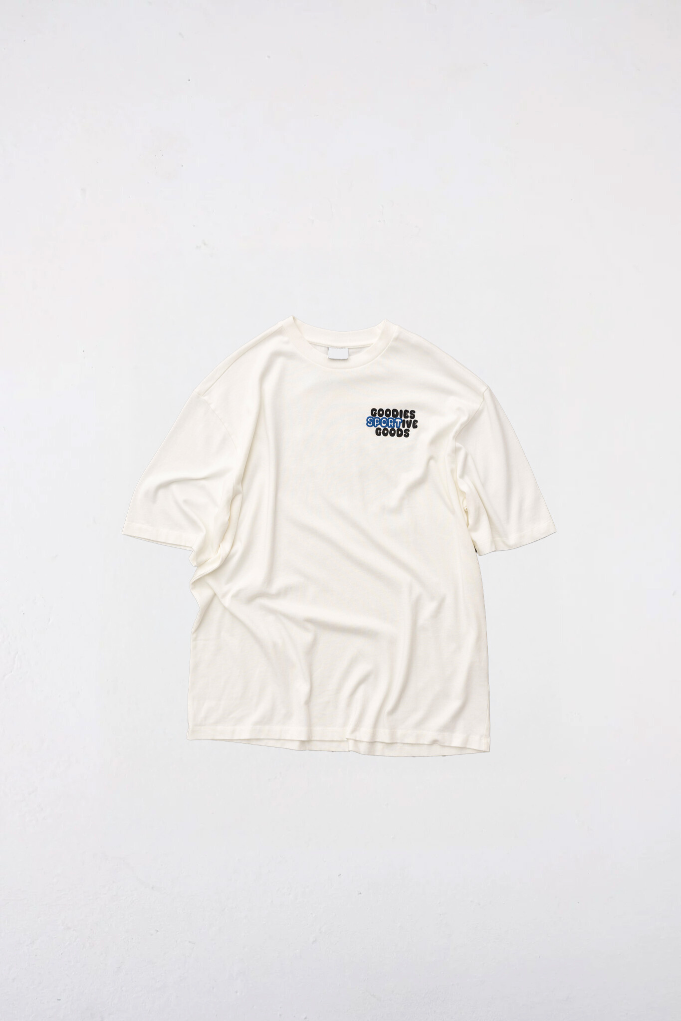 Goodies Sportive goods t-shirt in white and graphic in black and blue. Front flatlay view