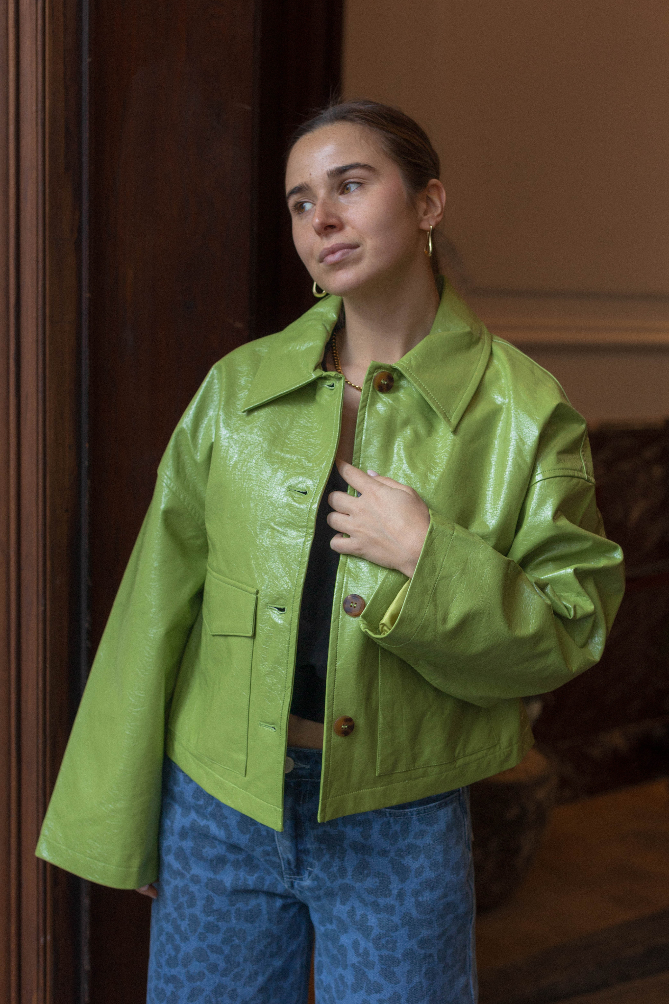 Model wearing the FRNCH carmelie jacket in green. Front view