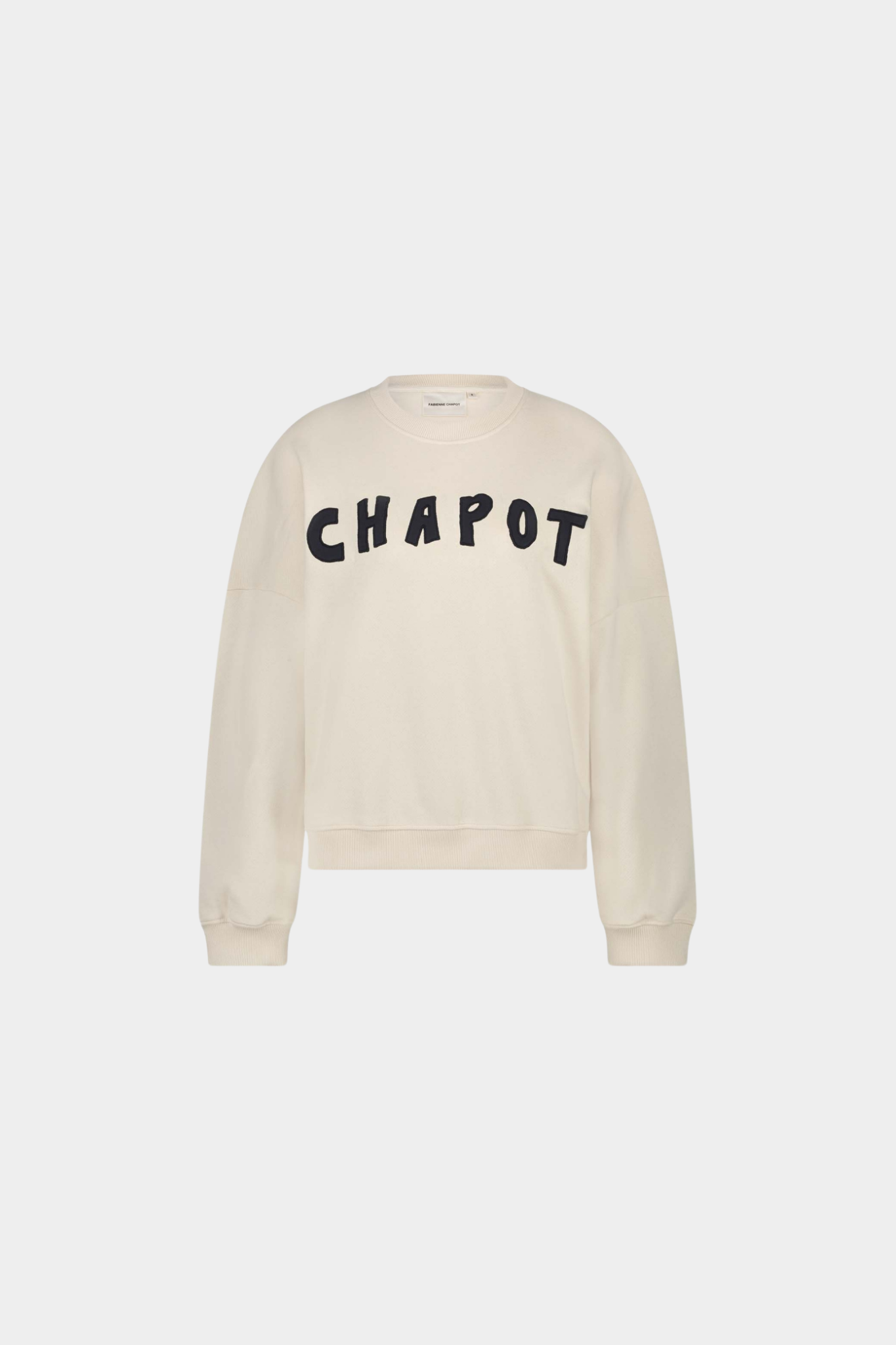 Fabienne Chapot amy sweater in warm white and logo in black. Front flatlay view