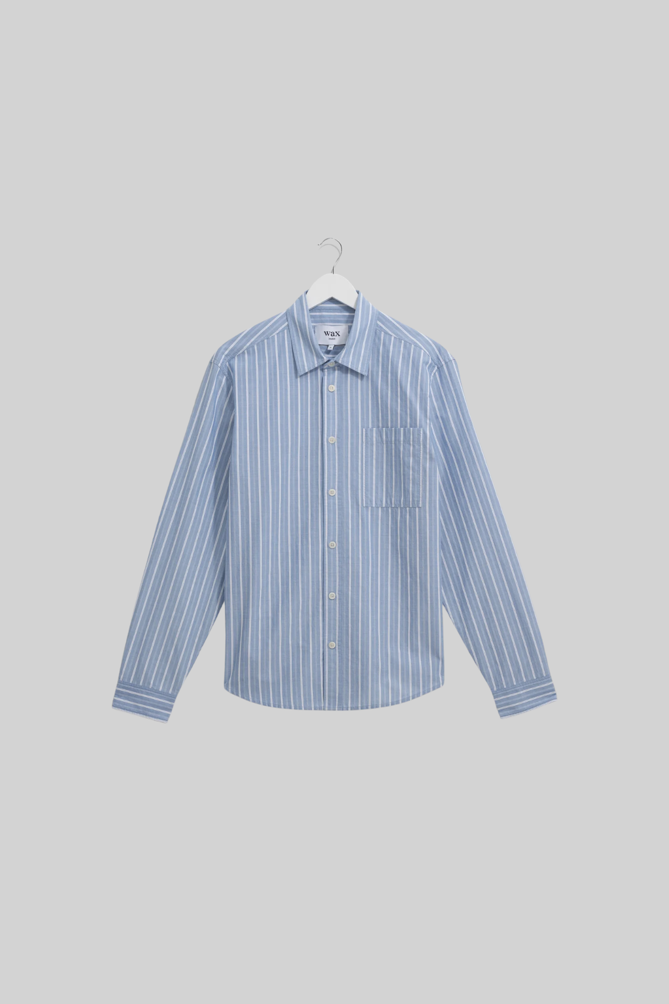 Wax London rove poplin stripe shirt in blue. Front flatlay view 