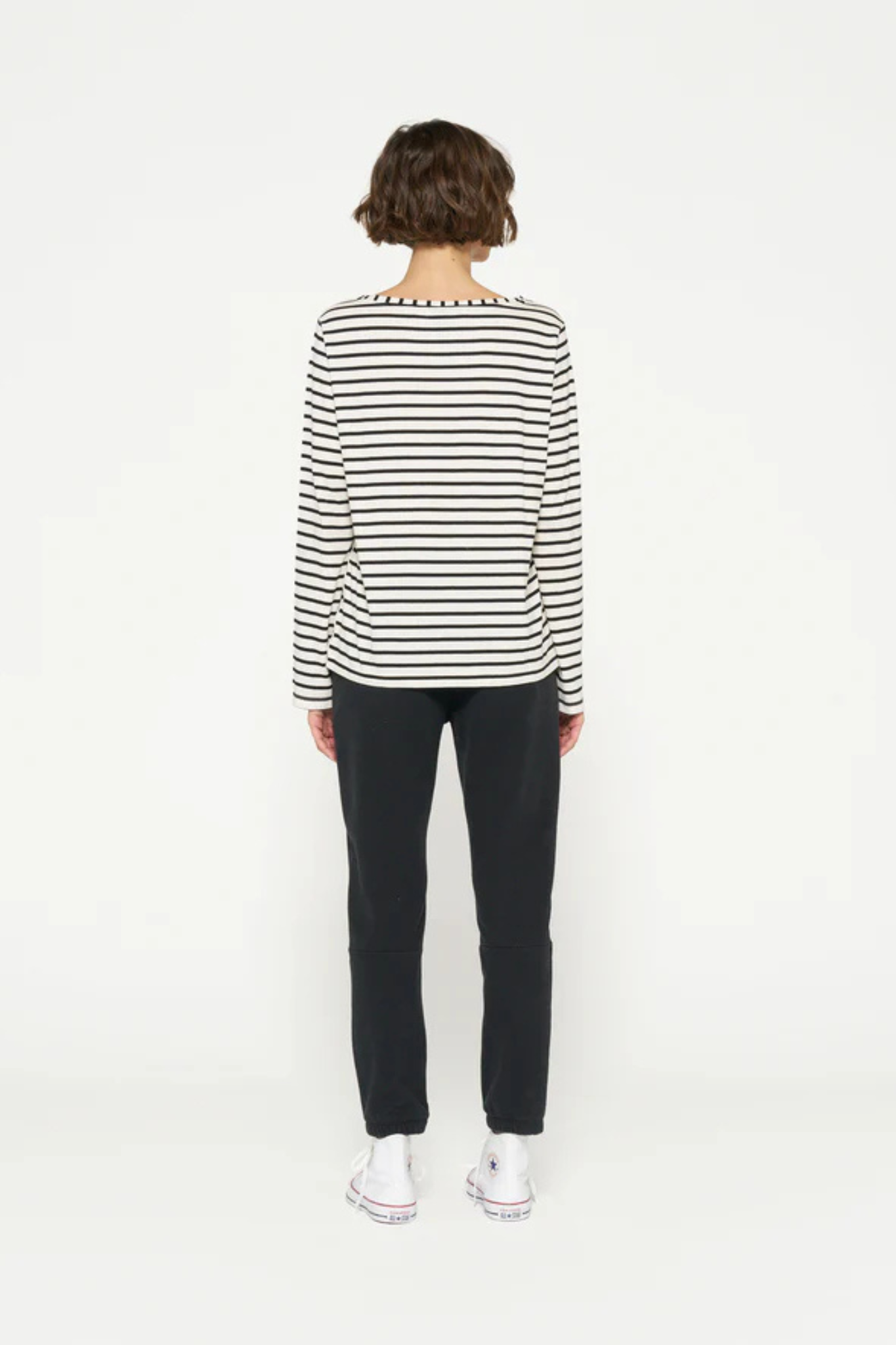 Model wearing the 10DAYS longsleeve in white and black stripe. Back view