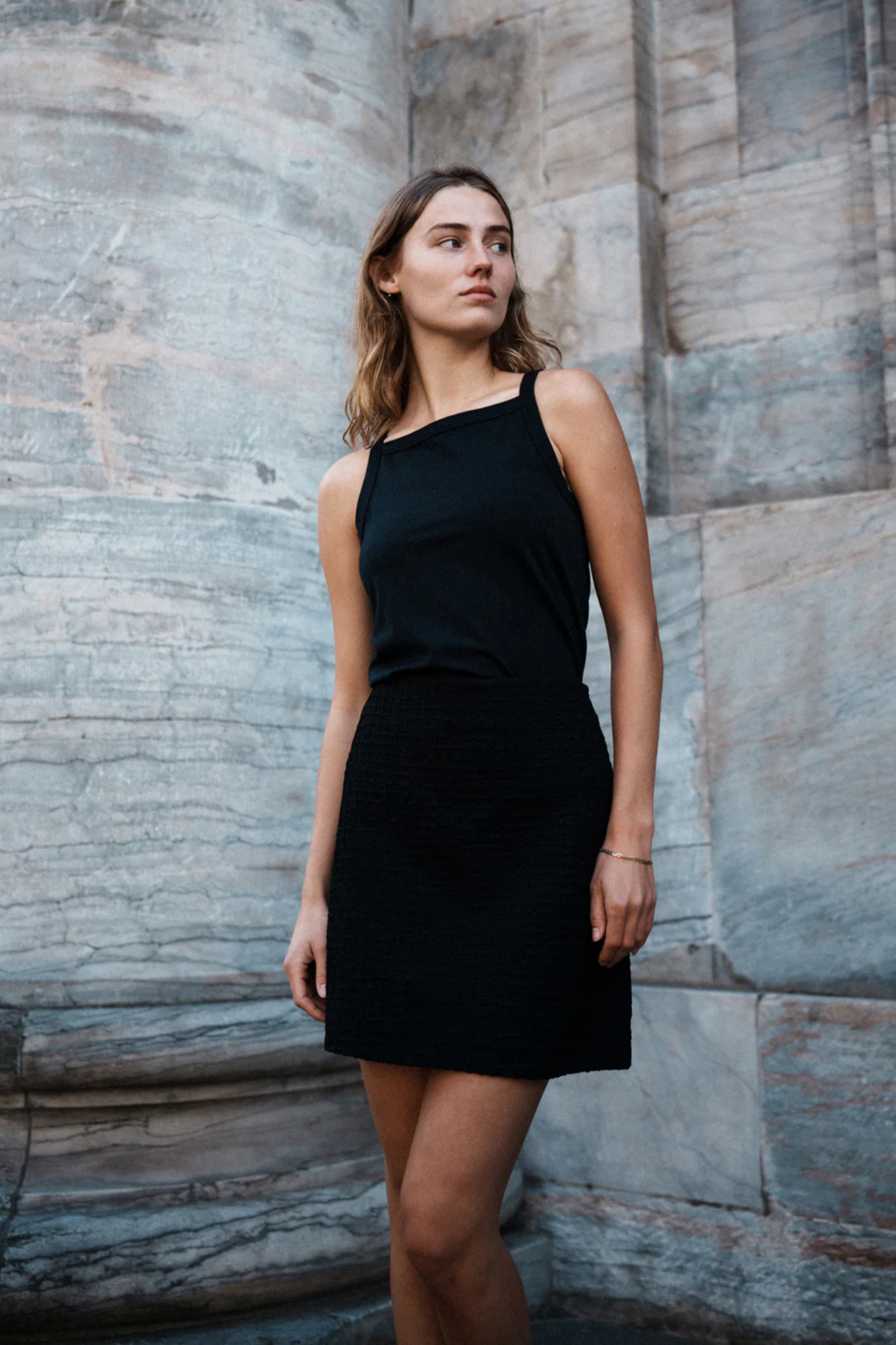 Model wearing the Modstrom gale skirt in black. Front view