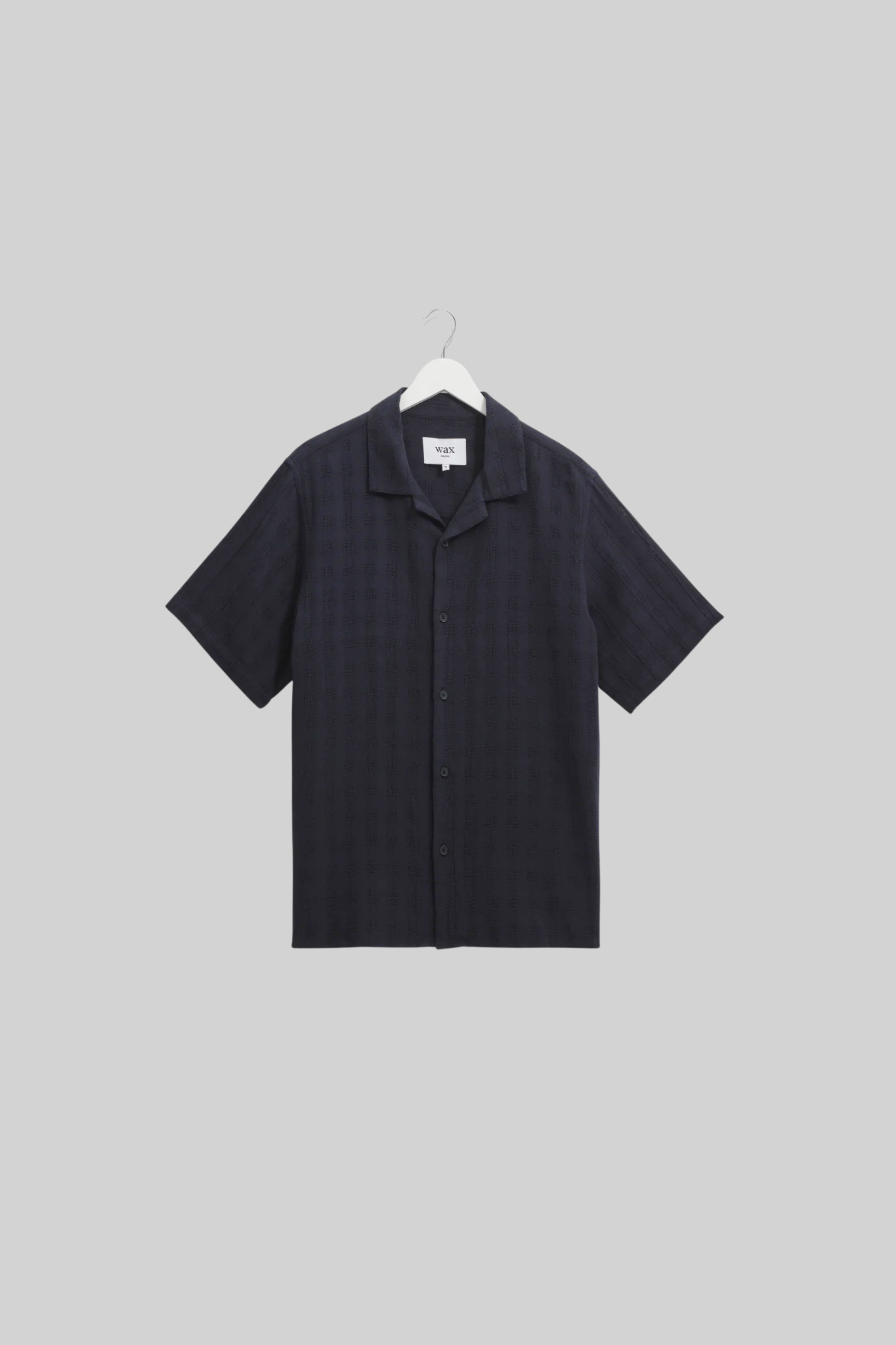 Wax London didcot box open weave grid shirt in navy. Front flatlay view 