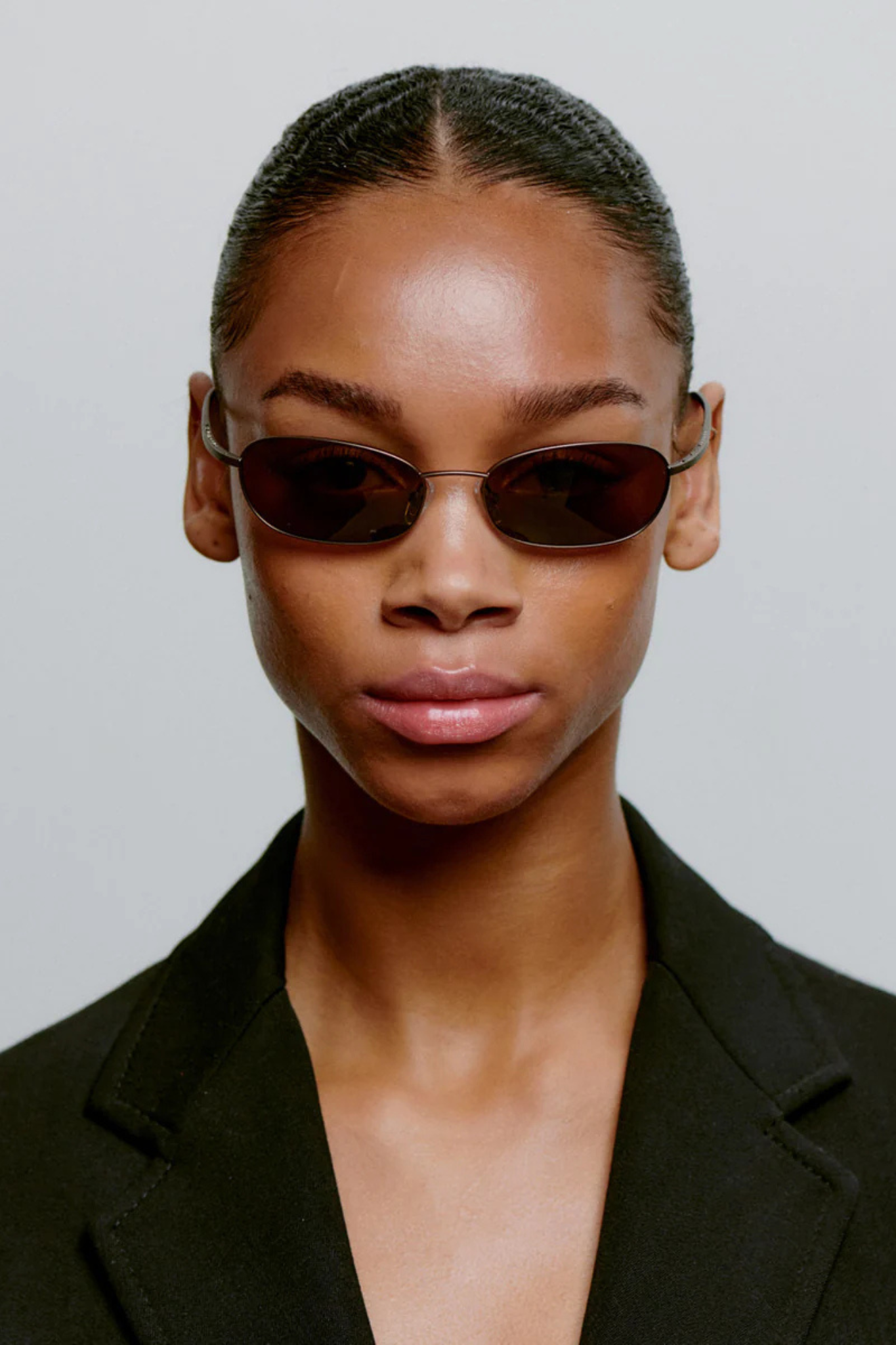 Model wearing the A. Kjaerbede jack sunglasses in matte brown. Front view