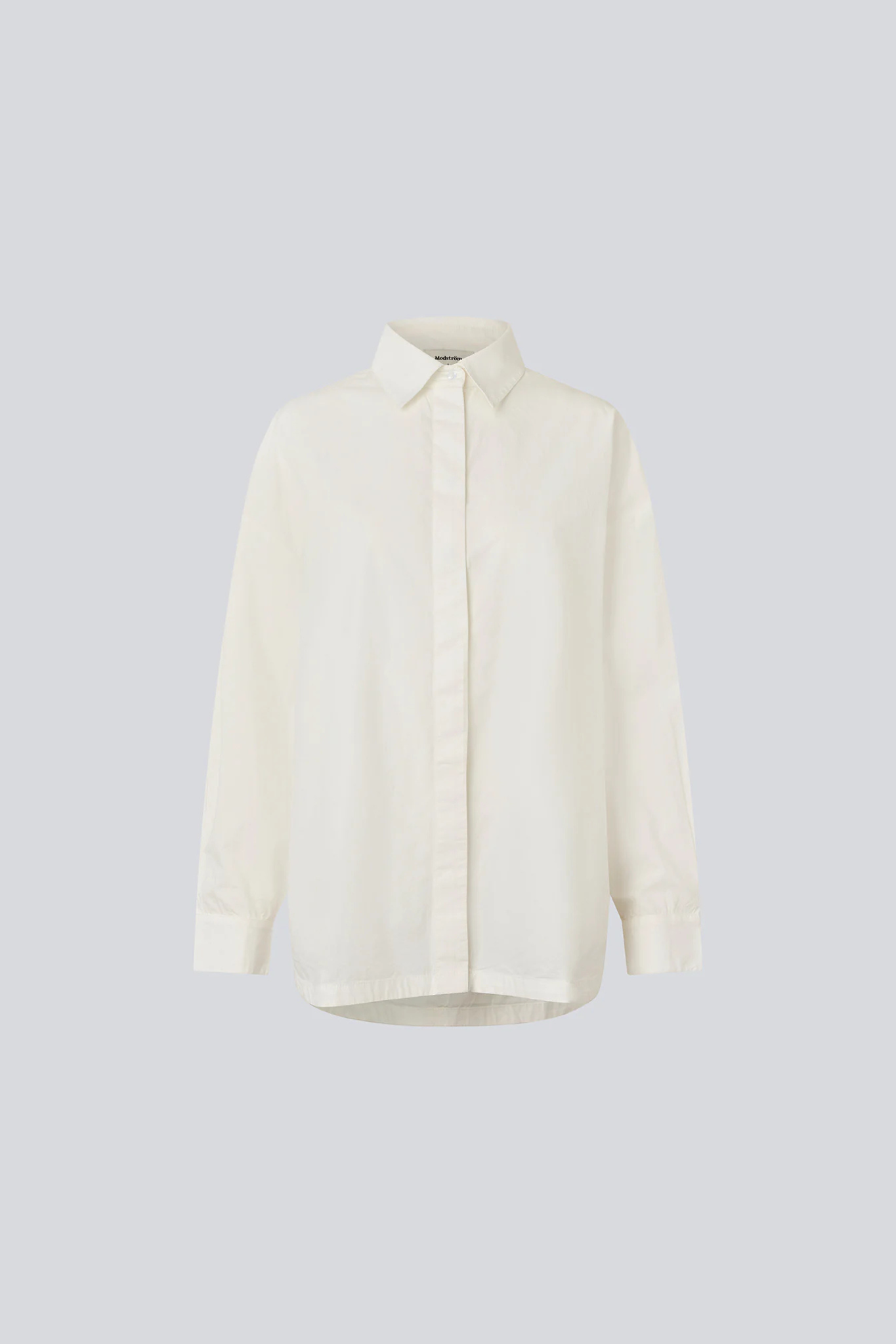 Modstrom myra shirt in soft white. Front flatlay view