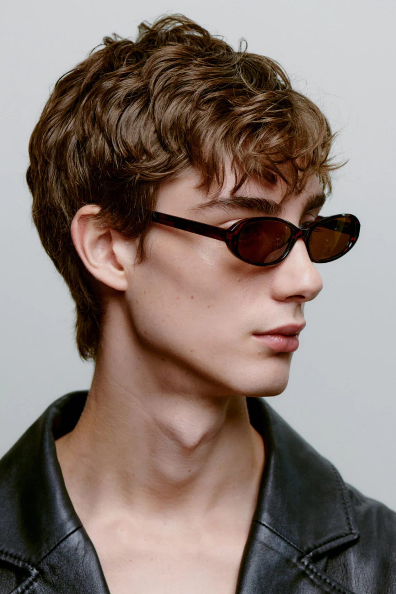 Model wearing the A. Kjaerbede macy sunglasses in demi tortoise. Side view