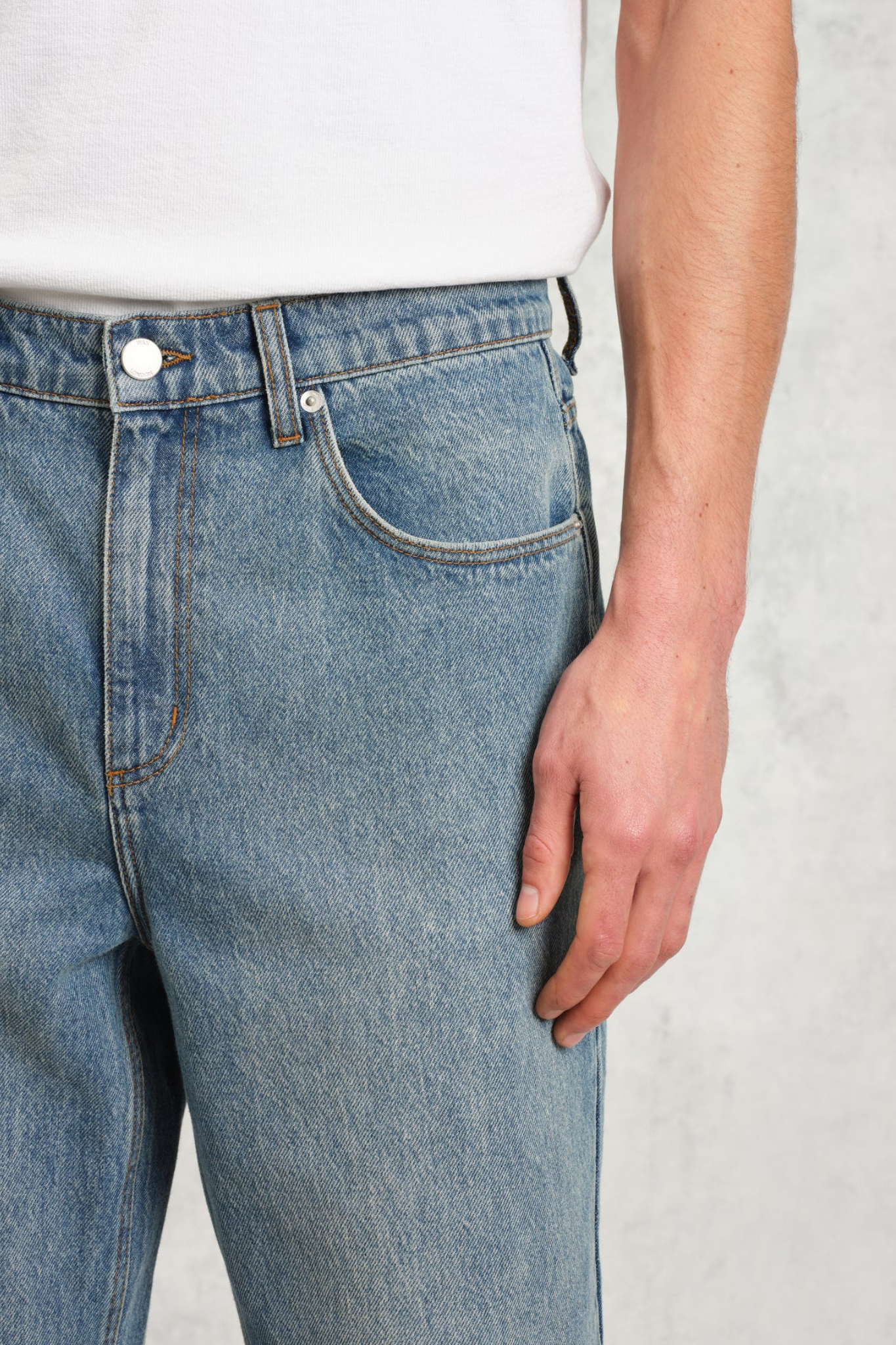 Model wearing the Wax London russel straight fit vintage denim jeans in vintage blue. Close front view 