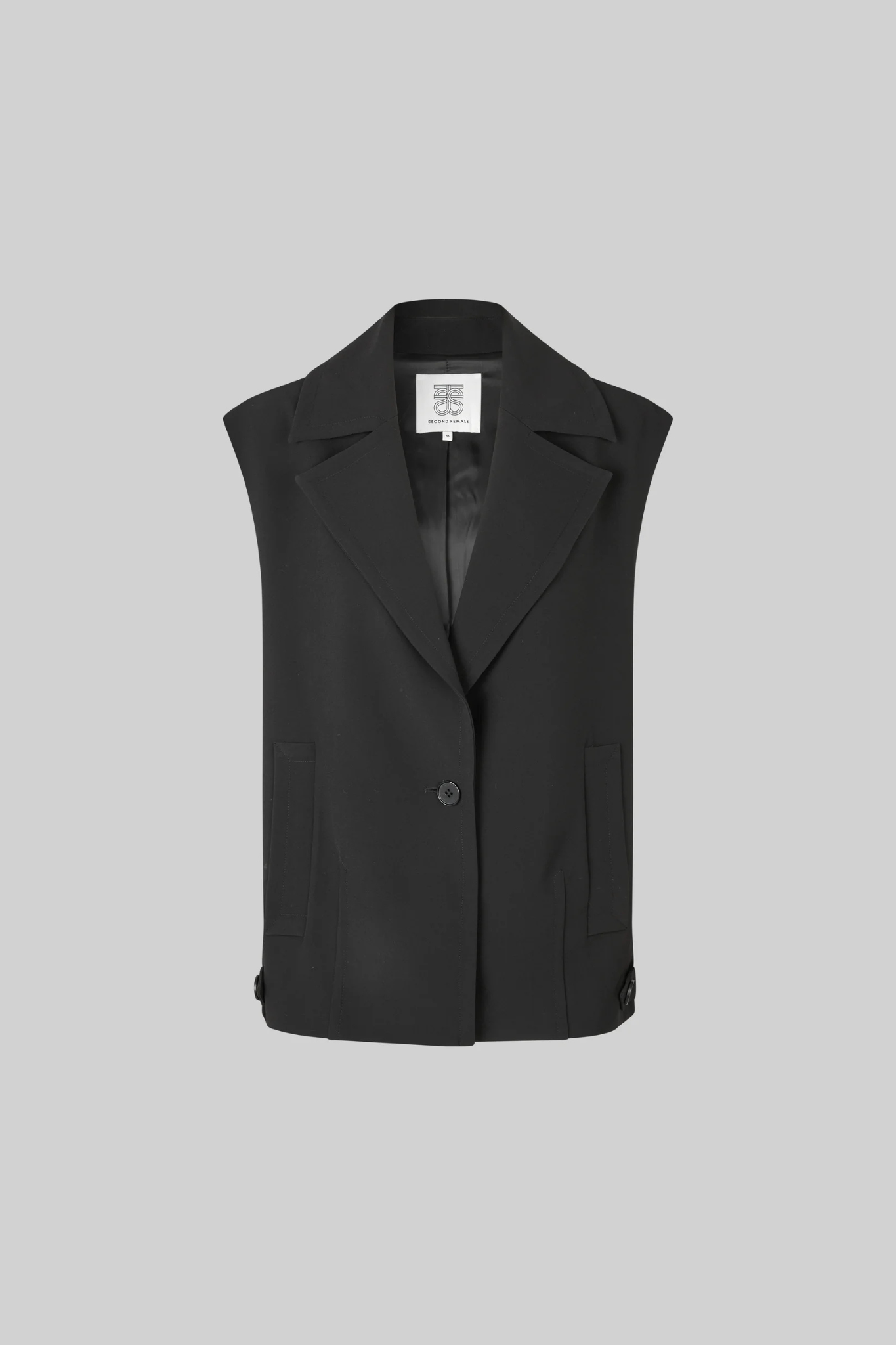 Second Female fique oversize waistcoat in black. Front flatlay view