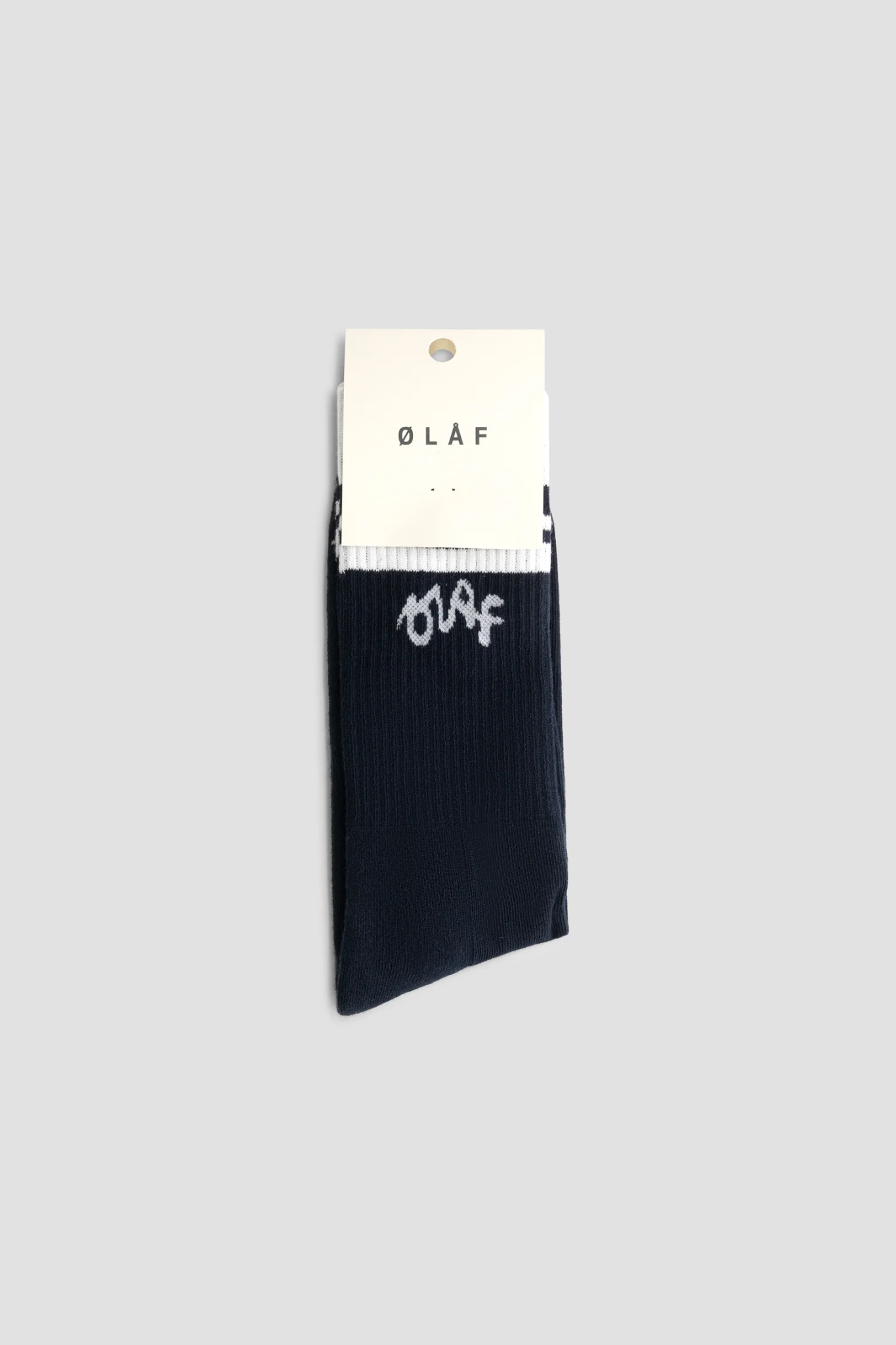 Olaf varsity socks in navy with logo in white. Package view